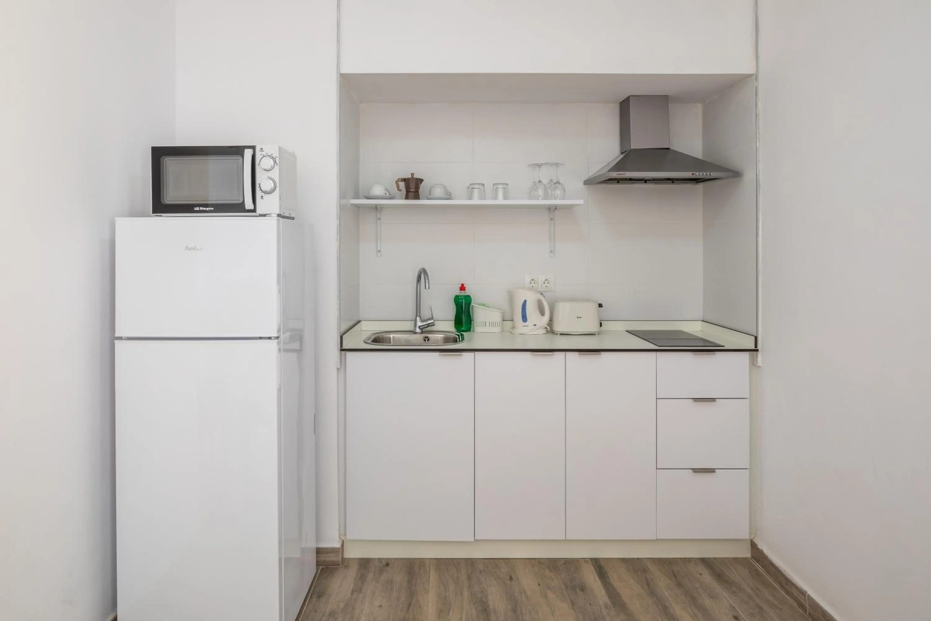 Kitchen or kitchenette in Aparthotel Puerto Cala Vadella