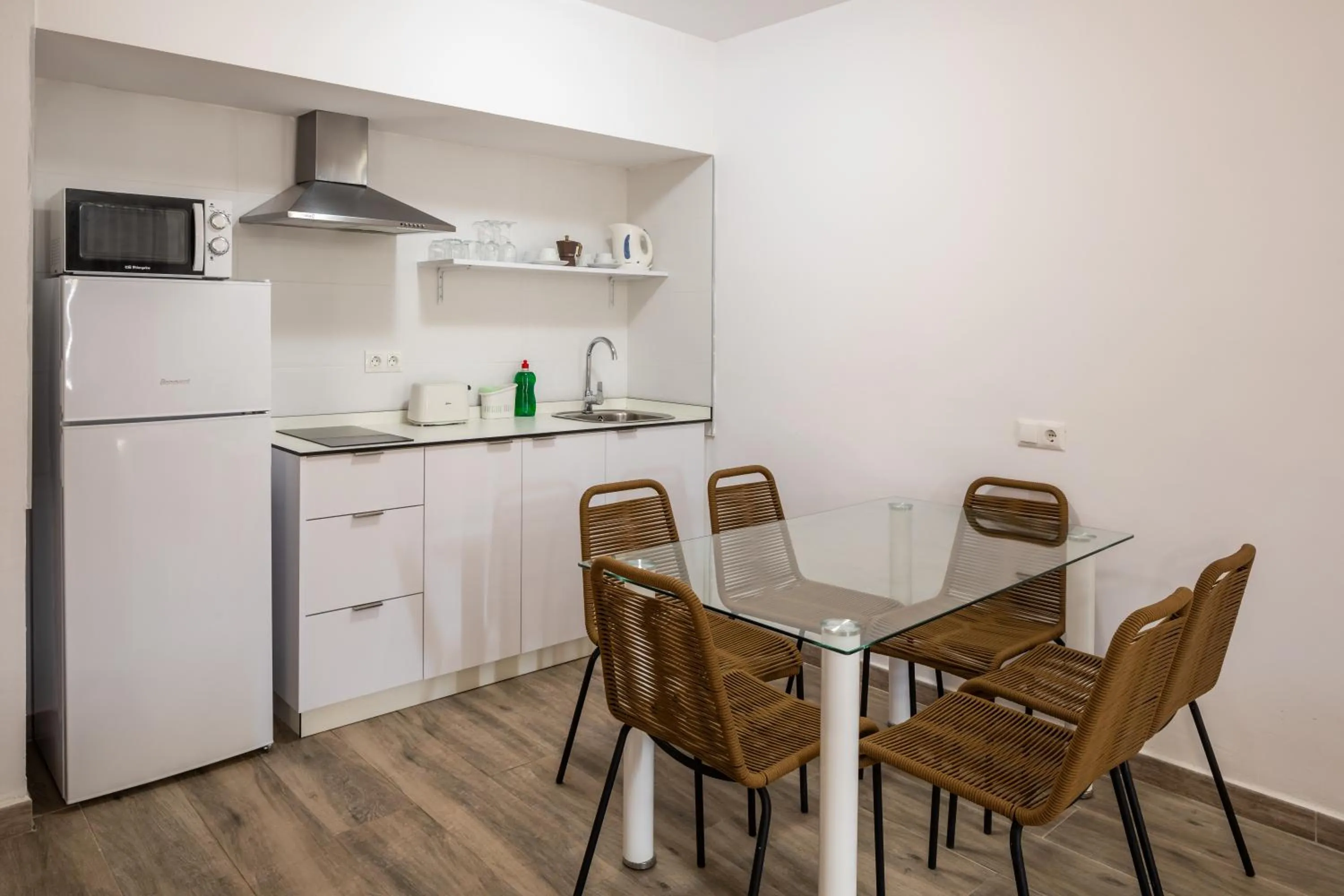 Kitchen or kitchenette in Aparthotel Puerto Cala Vadella