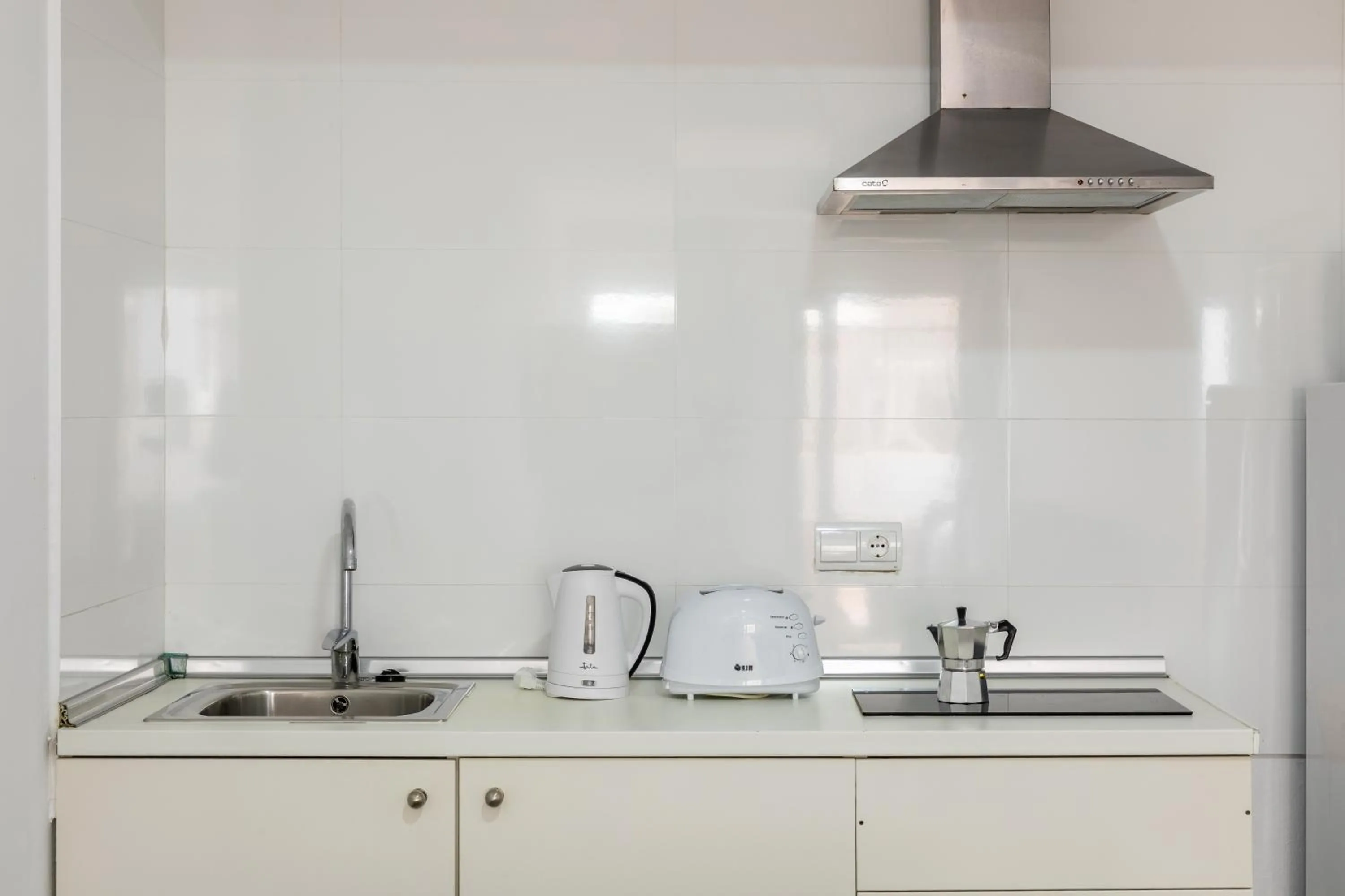 Kitchen or kitchenette in Aparthotel Puerto Cala Vadella