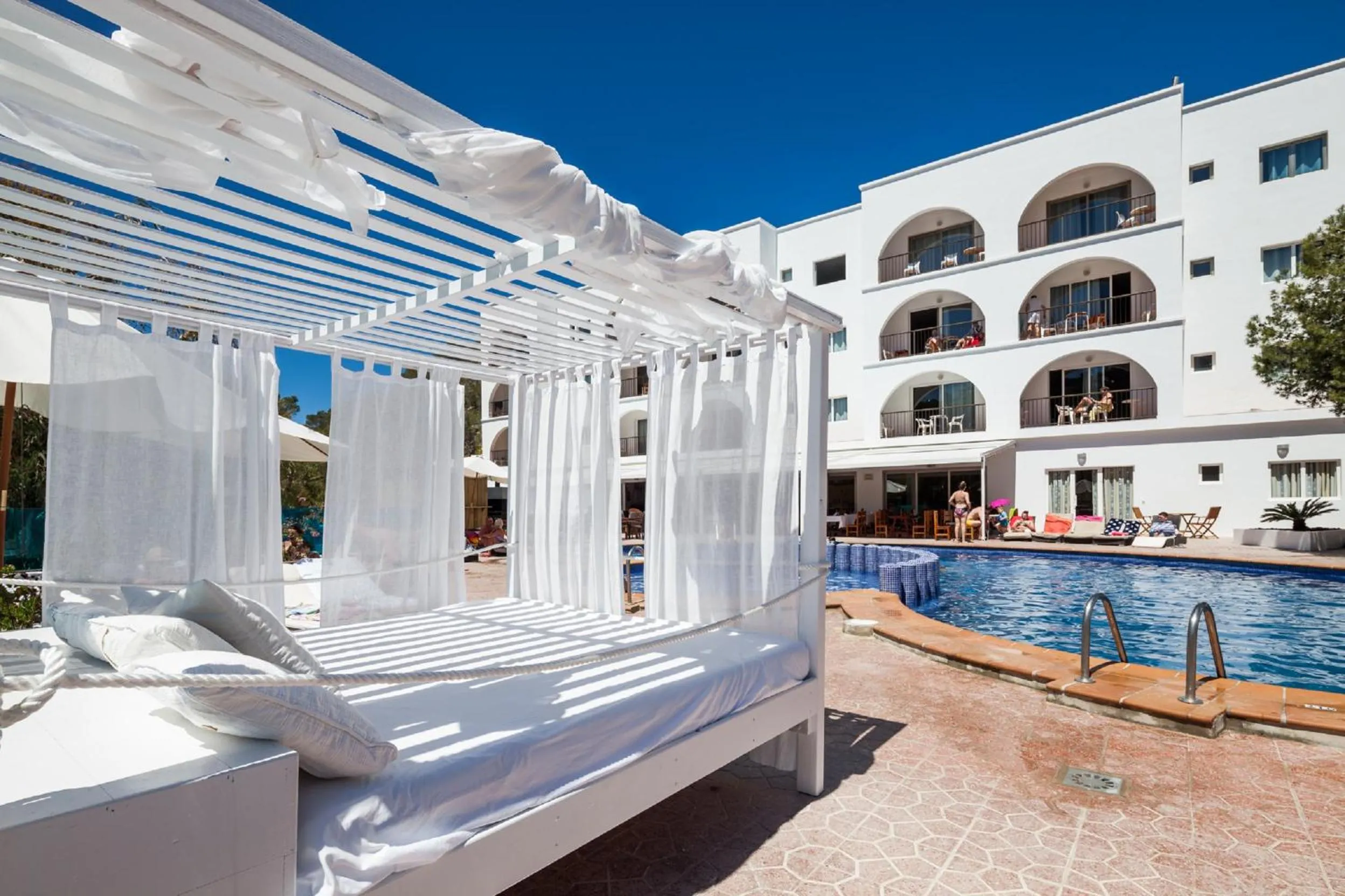 Swimming pool in Aparthotel Puerto Cala Vadella