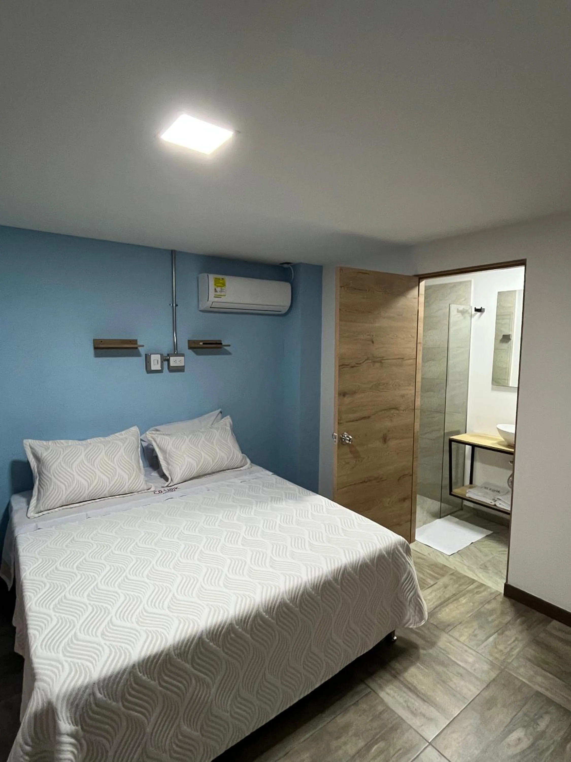 Bed in CoLinkHouse Hotel