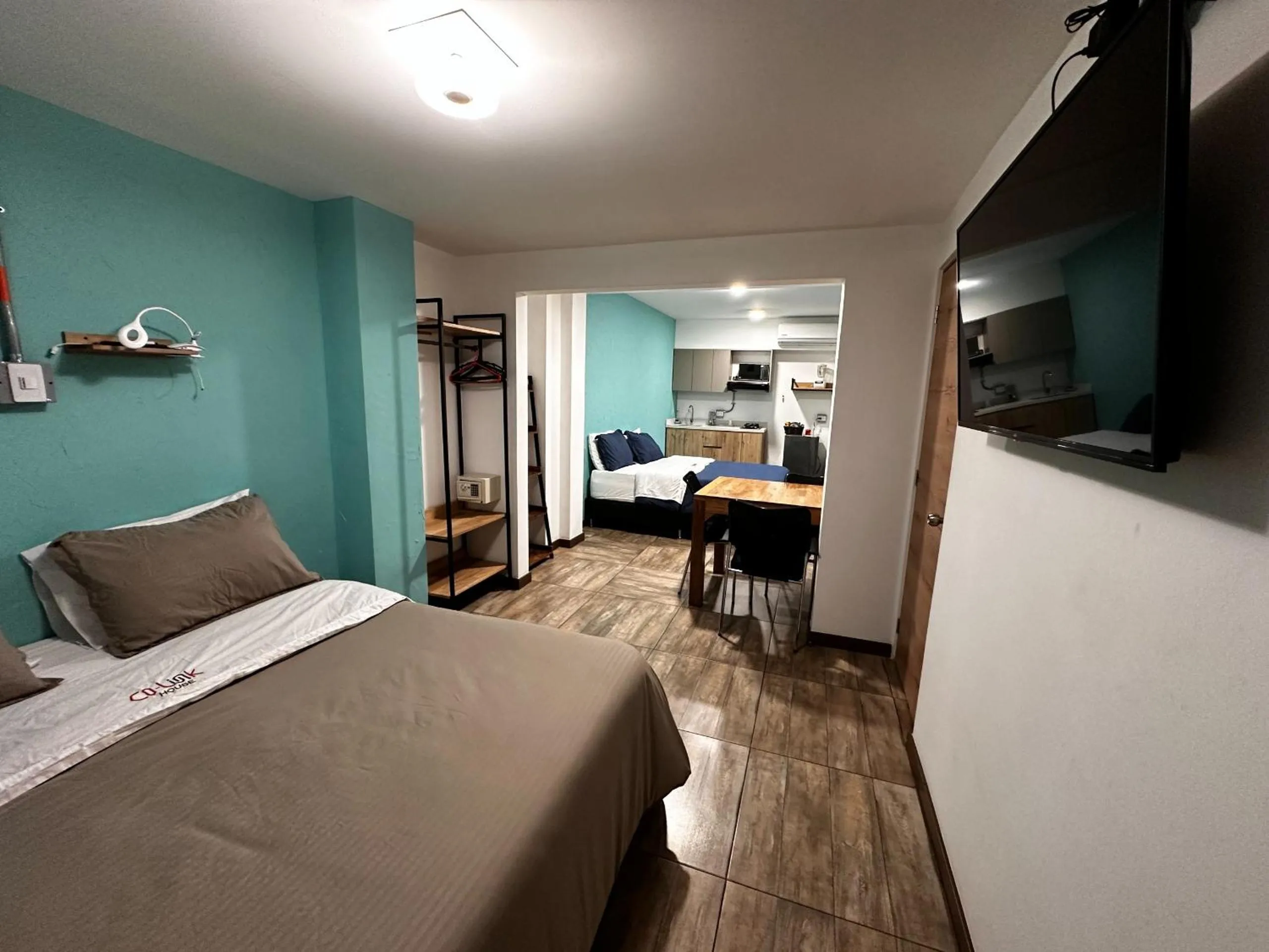 Bed in CoLinkHouse Hotel