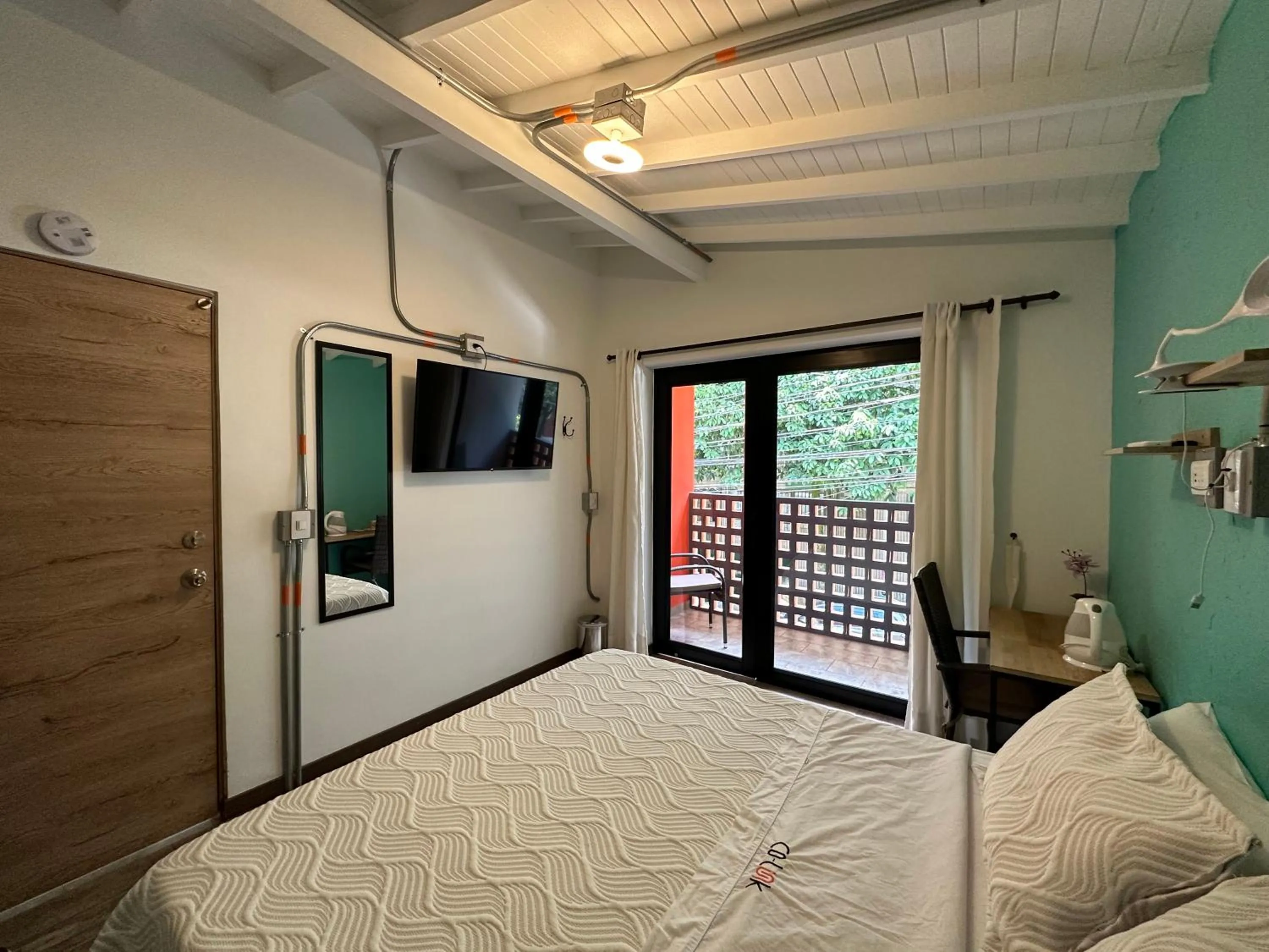 Bed in CoLinkHouse Hotel