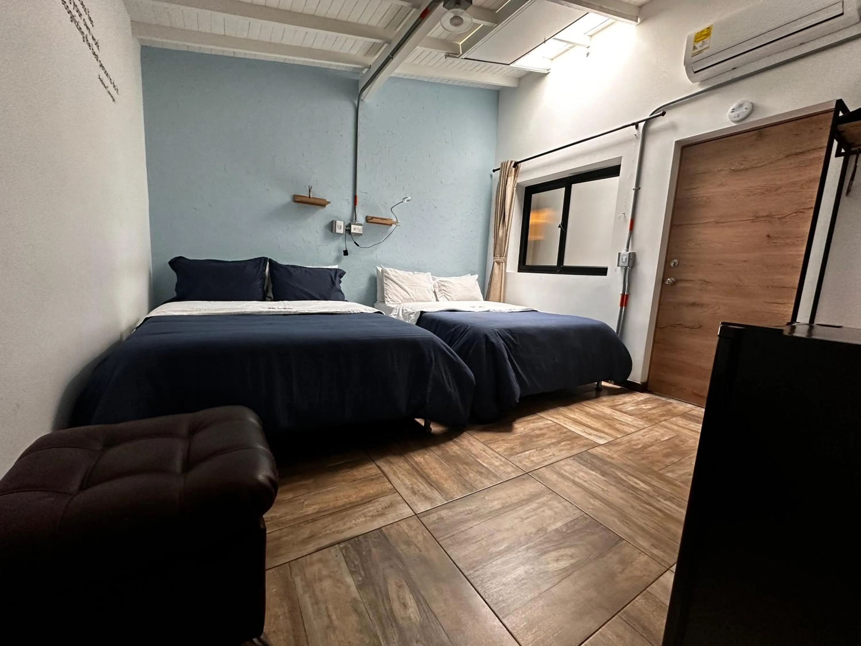 Bed in CoLinkHouse Hotel