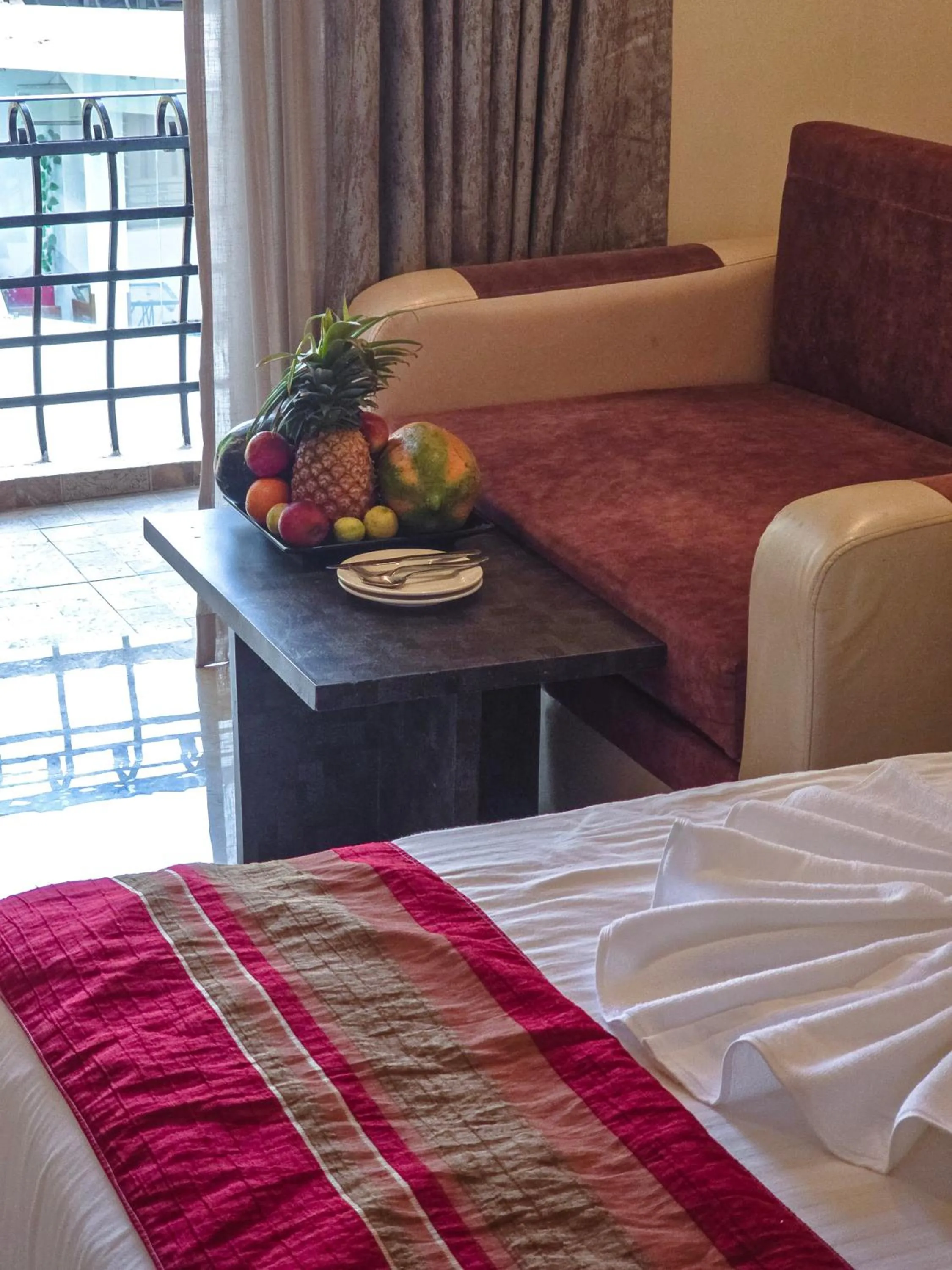 Seating area, Bed in The Verda De Miranda Resort Morjim North Goa