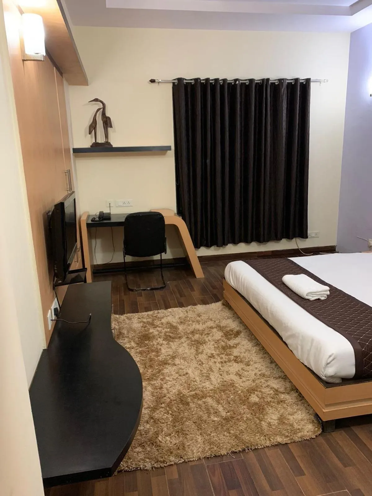 Photo of the whole room, Bed in THE REJOICE VENTURE