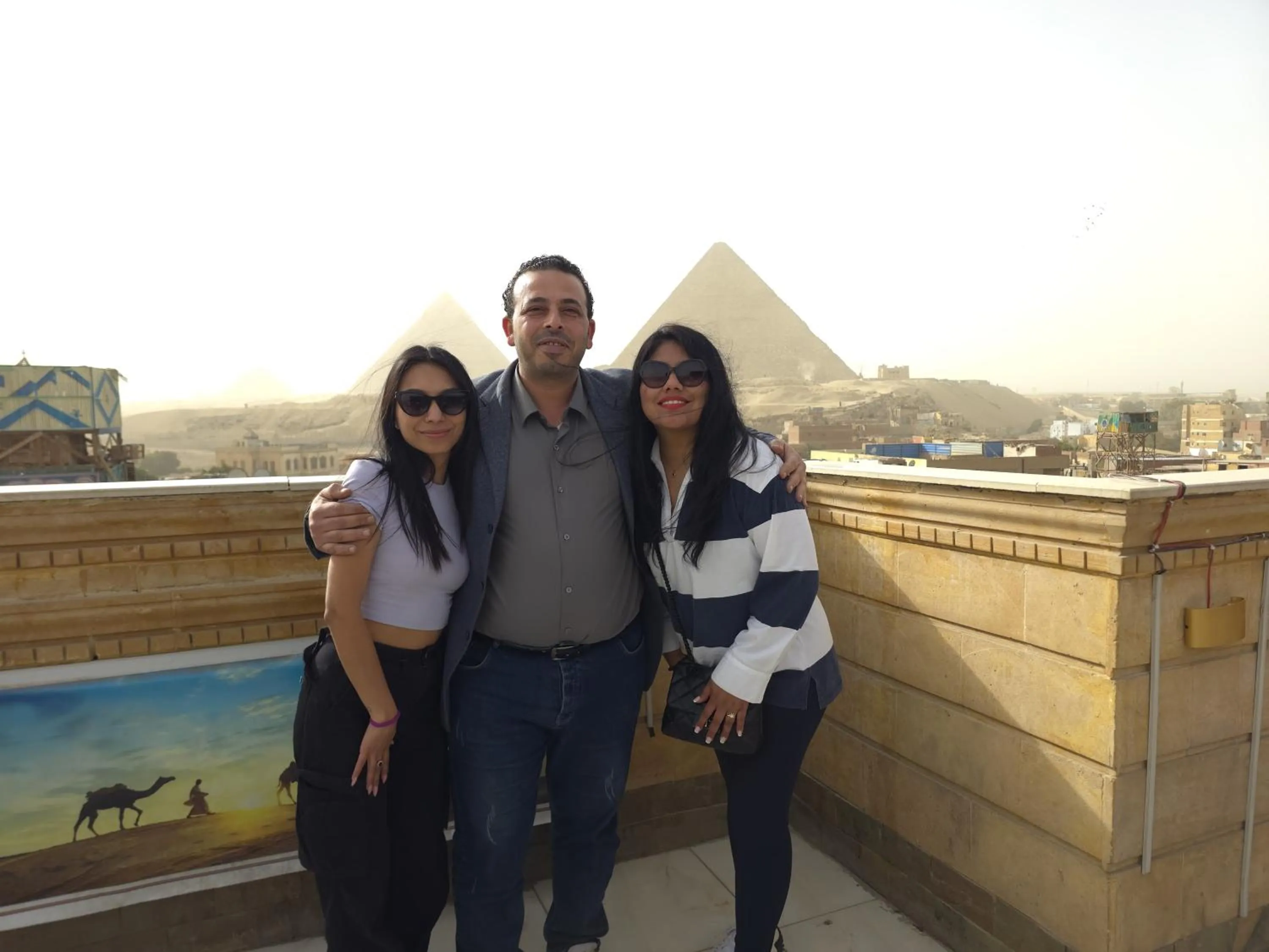 group of guests in Zeina pyramids view