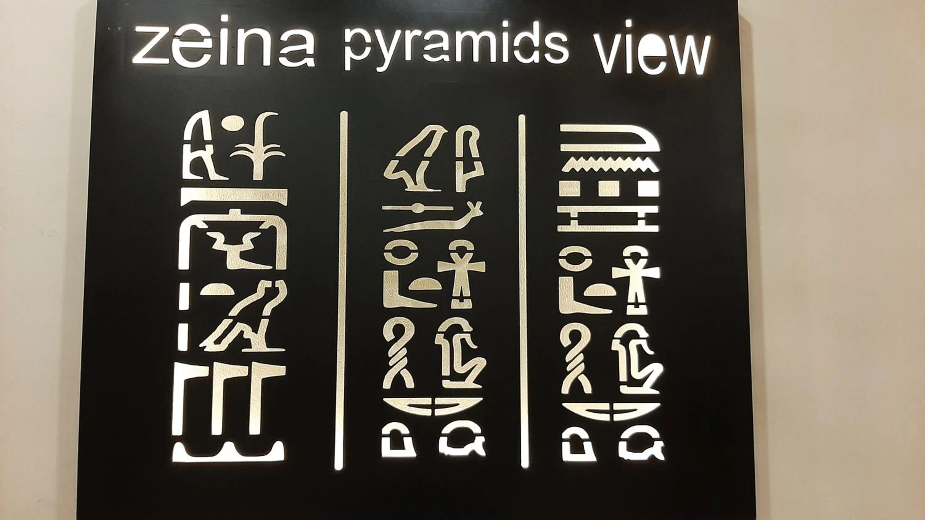 Logo/Certificate/Sign in Zeina pyramids view