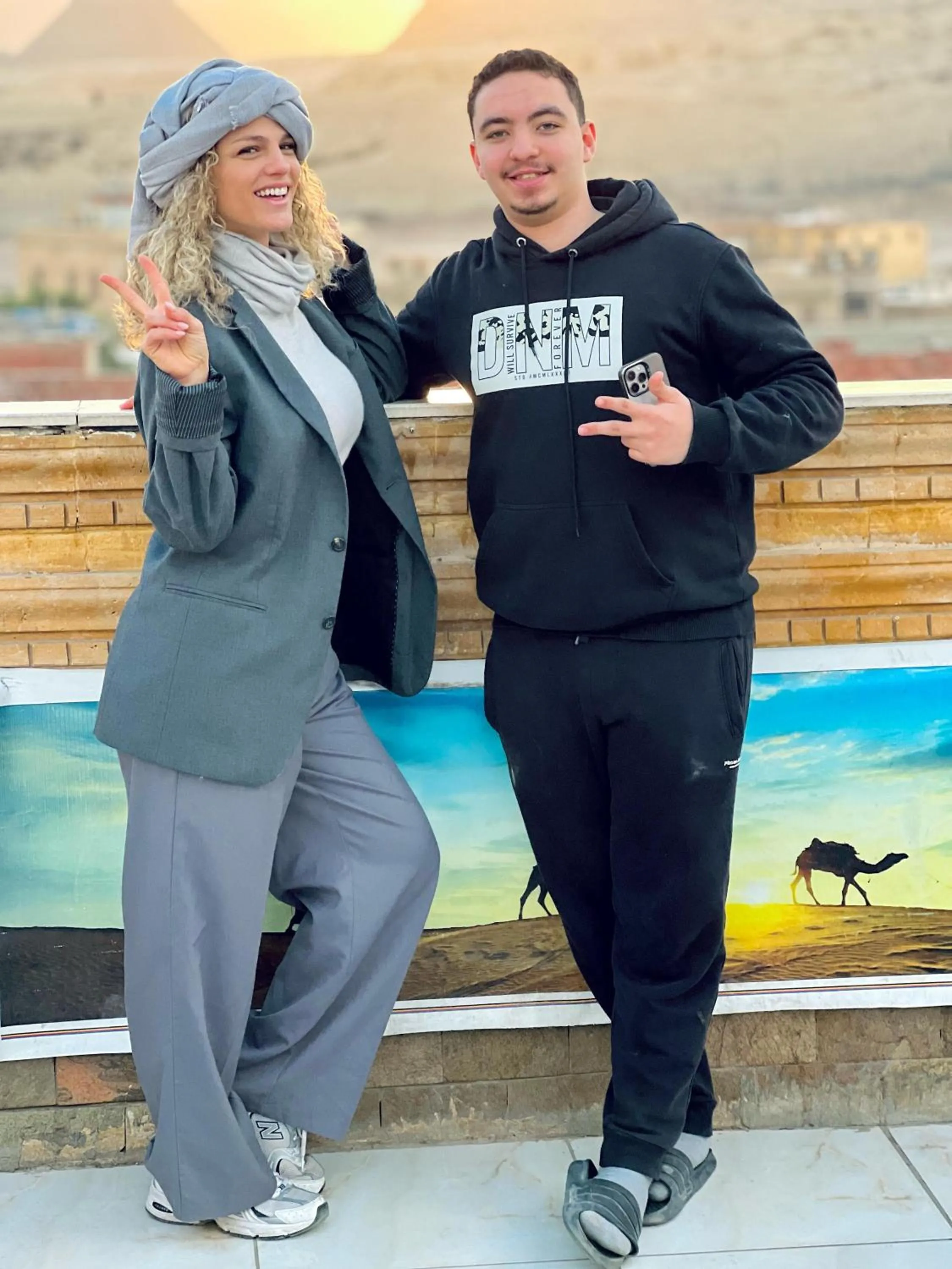 group of guests in Zeina pyramids view