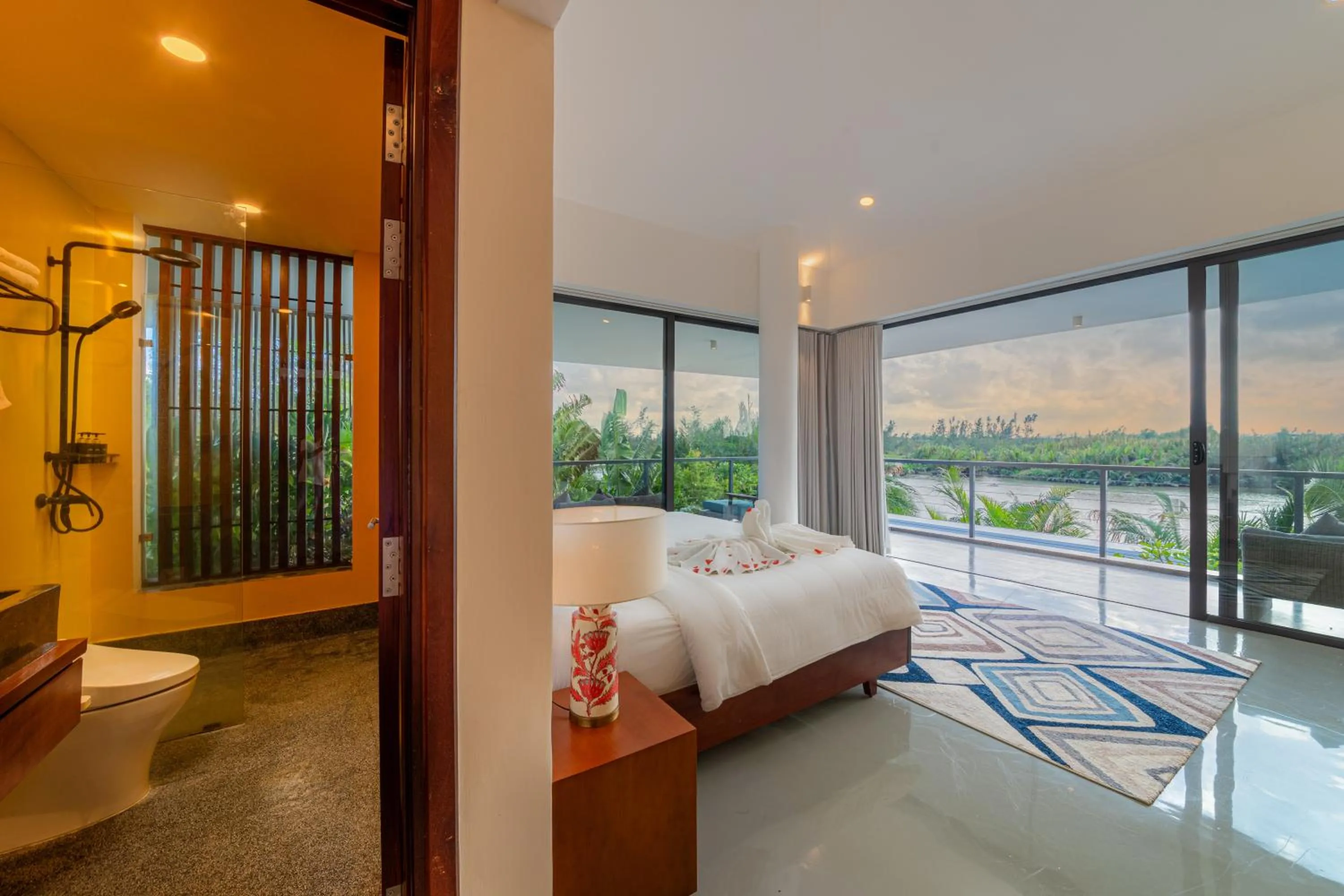Photo of the whole room, Bed in Akala Villa Hoi An