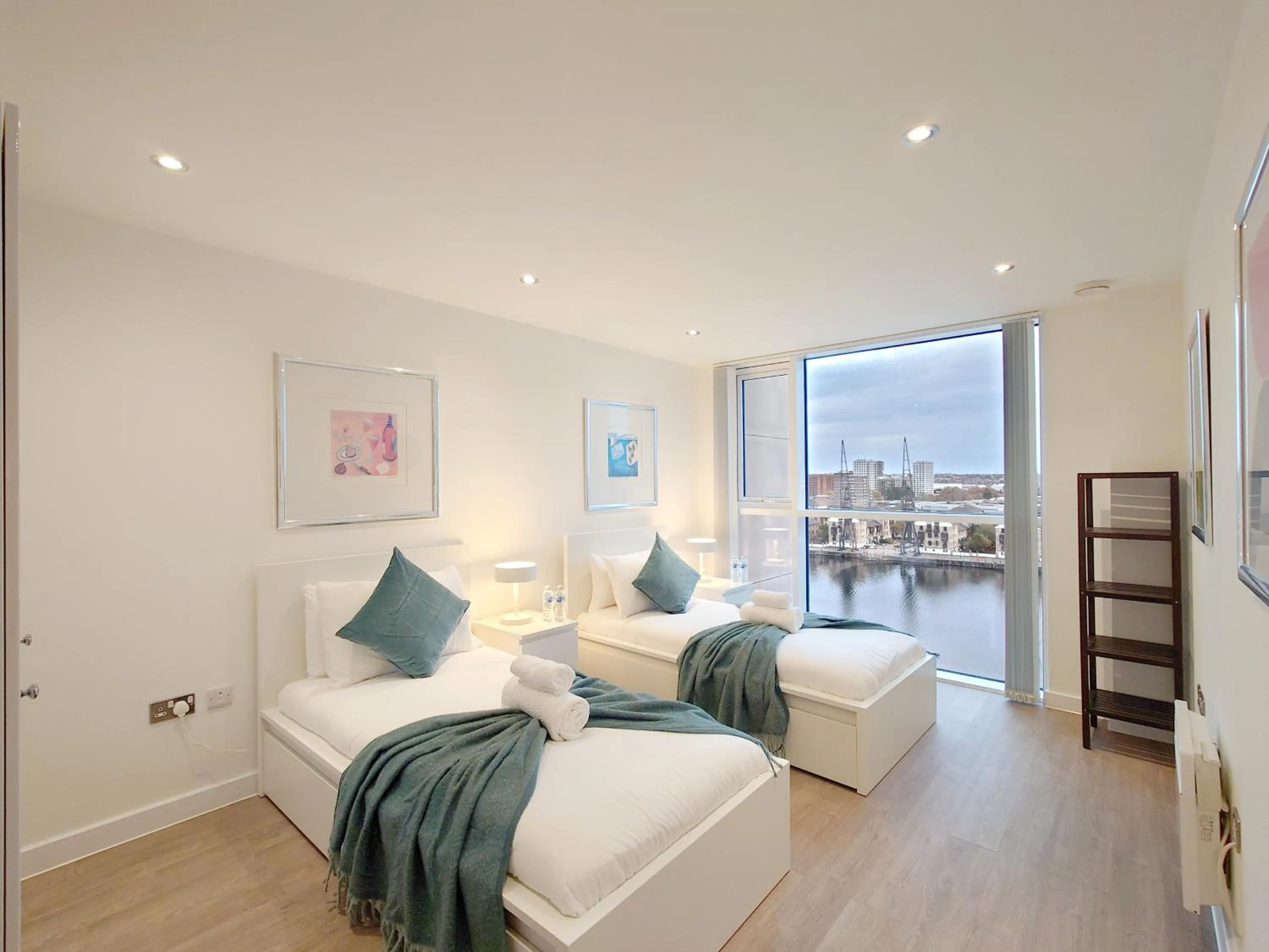 Bed in Deluxe Two Bed Apartment with River & City View