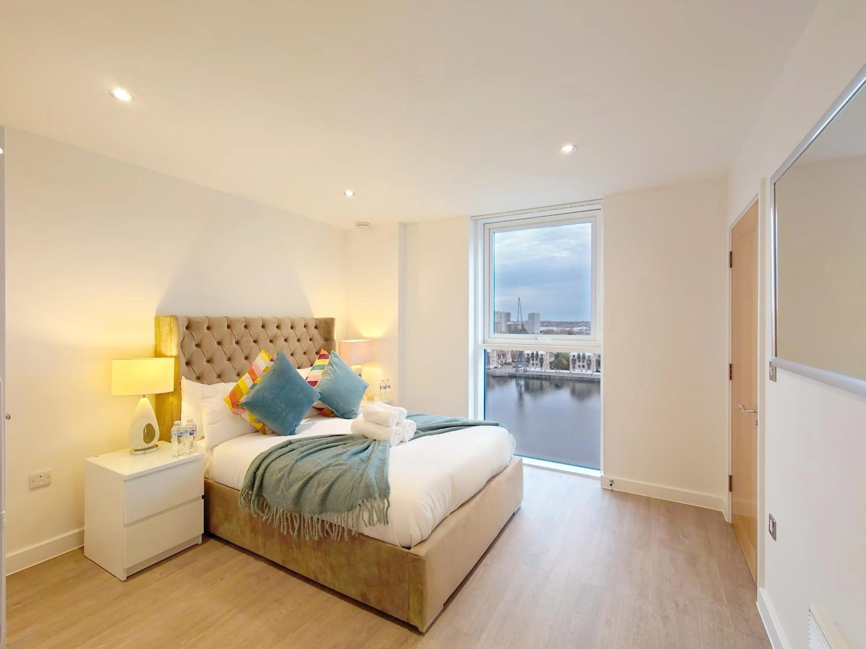 Bedroom, Bed in Deluxe Two Bed Apartment with River & City View