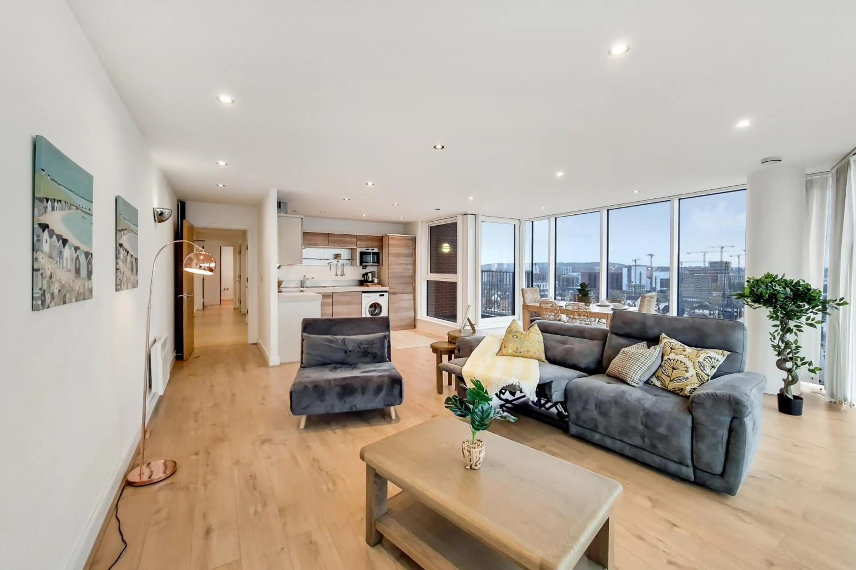 Living room in Deluxe Two Bed Apartment with River & City View