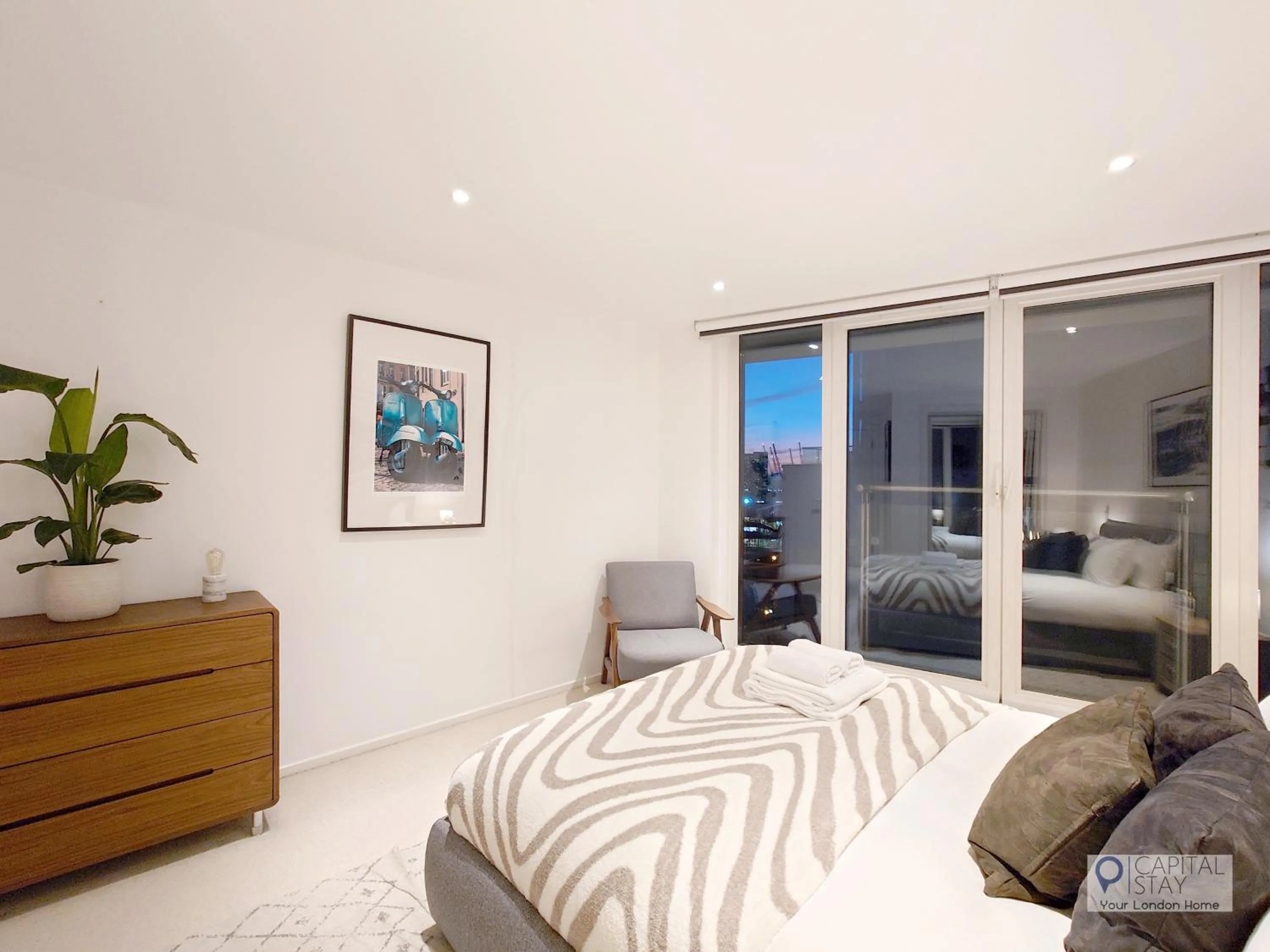 Bedroom, Bed in Deluxe Two Bed Apartment with River & City View