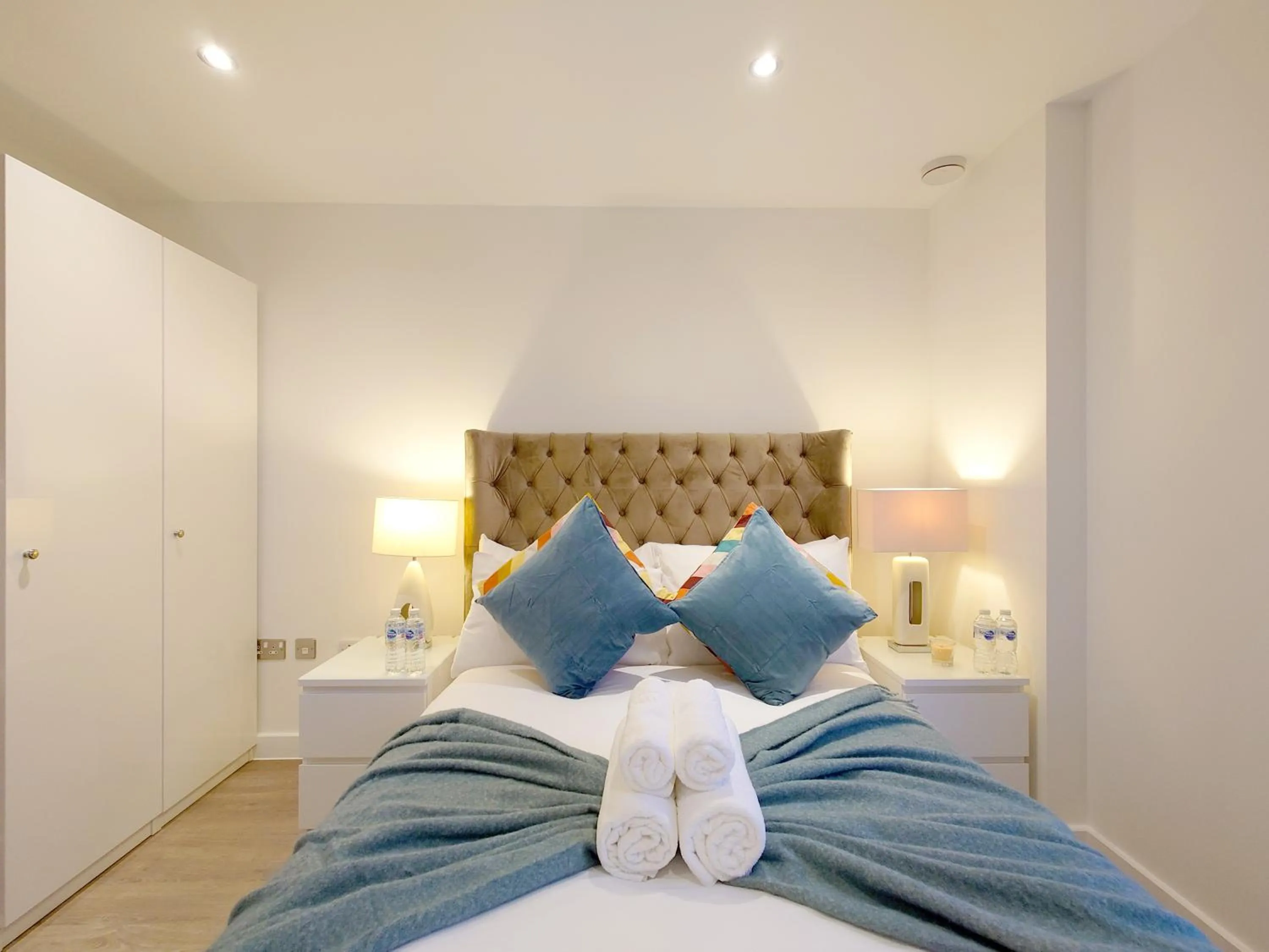 Bed in Deluxe Two Bed Apartment with River & City View