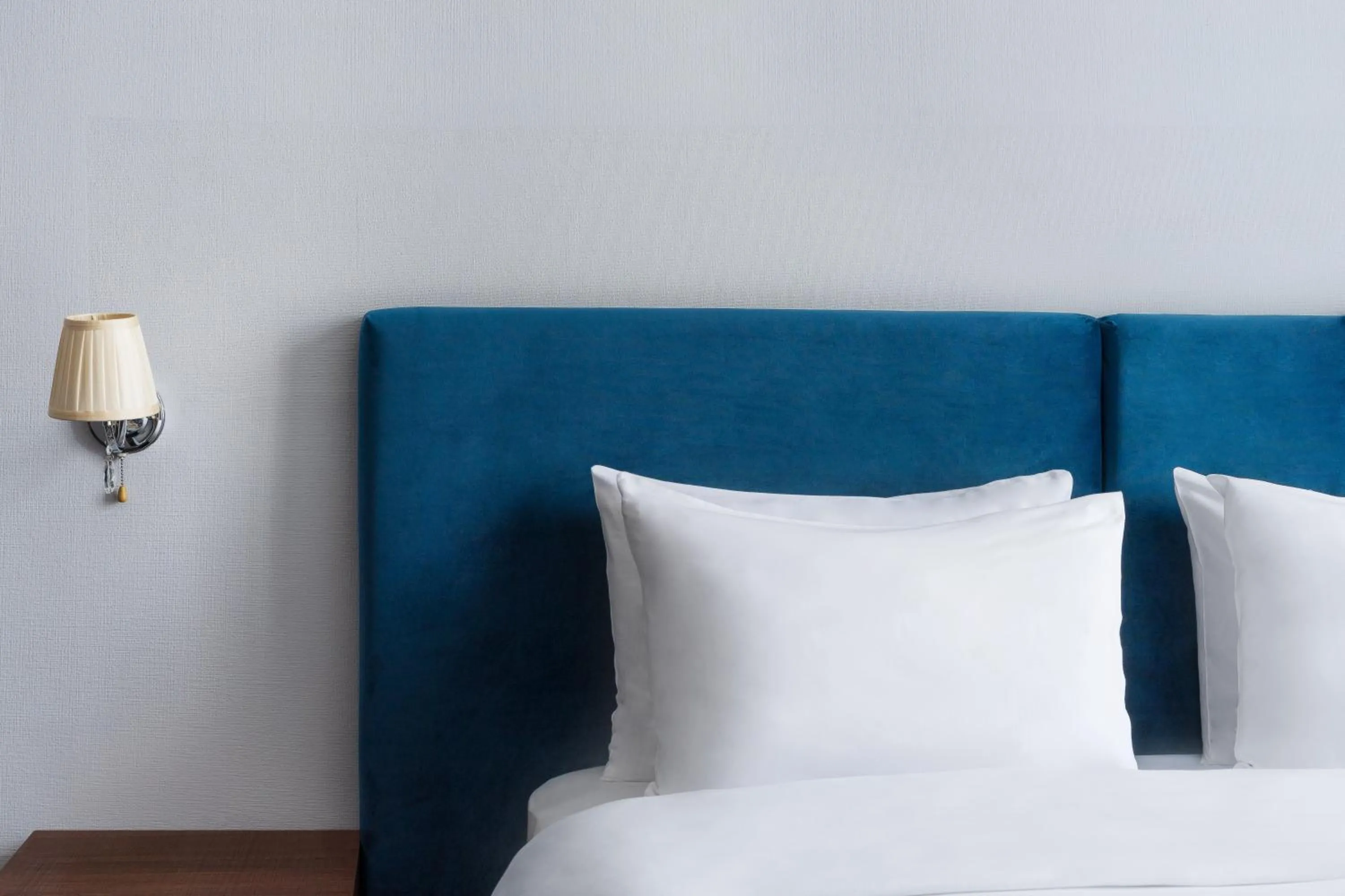 Bed in Alma Boutique Hotel