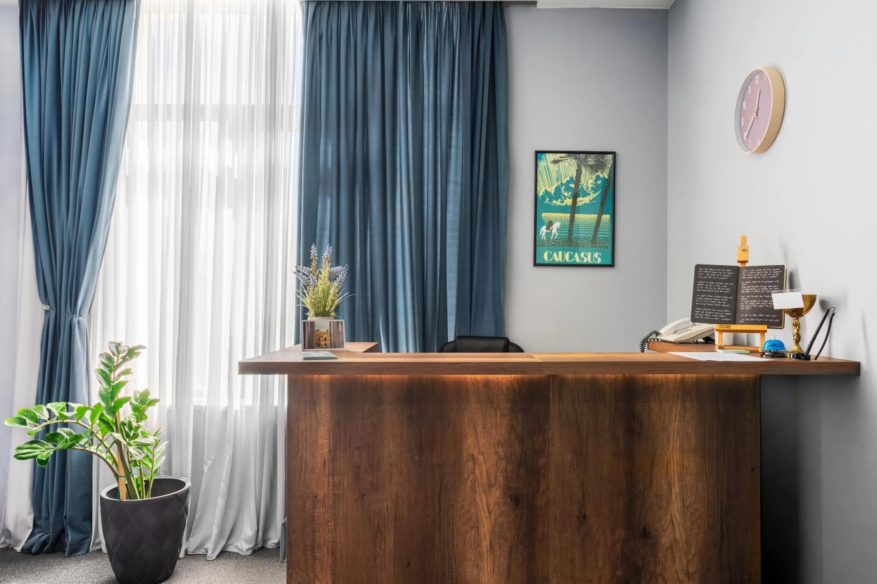 Lobby or reception in Alma Boutique Hotel