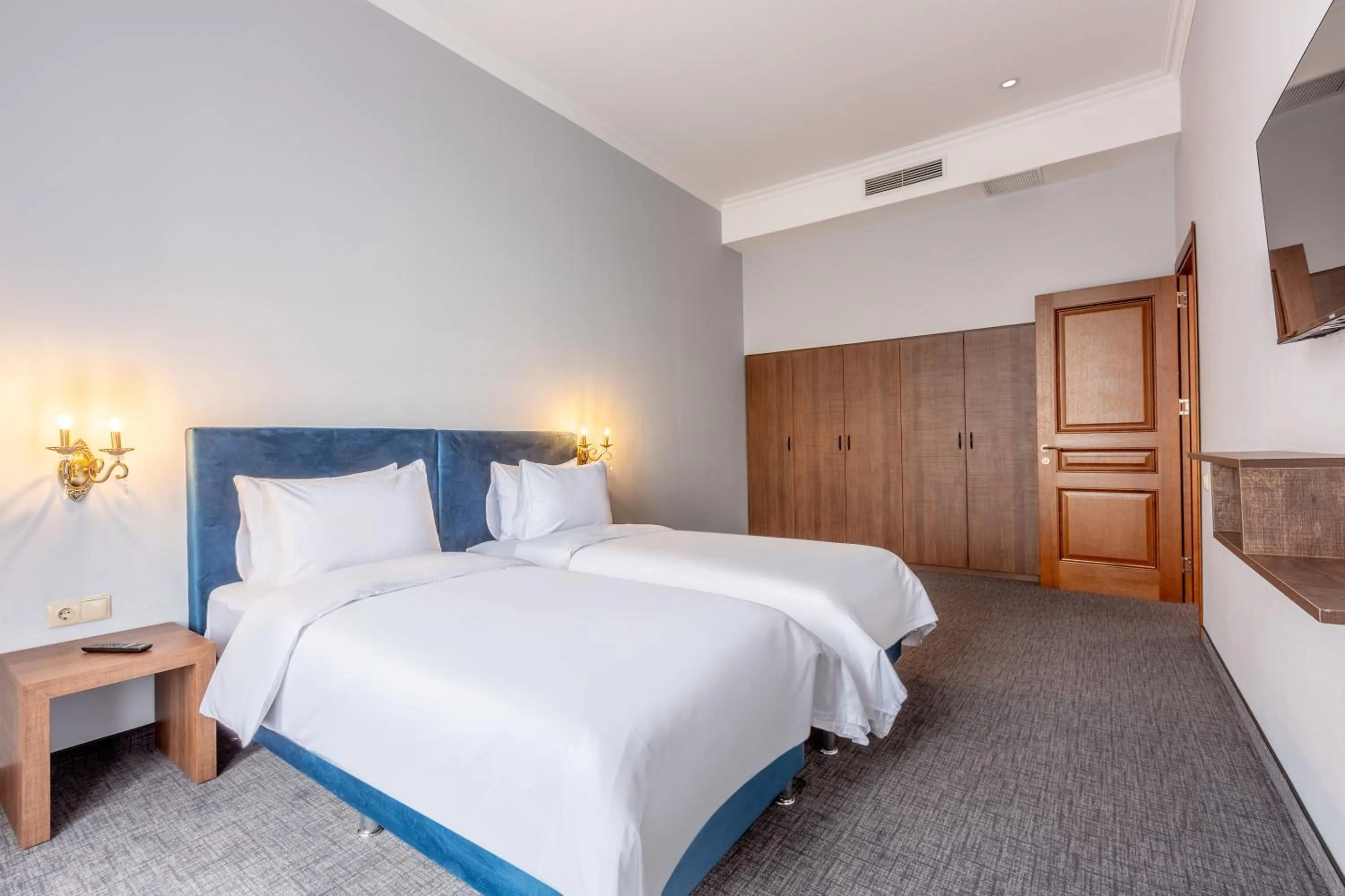 Bed in Alma Boutique Hotel