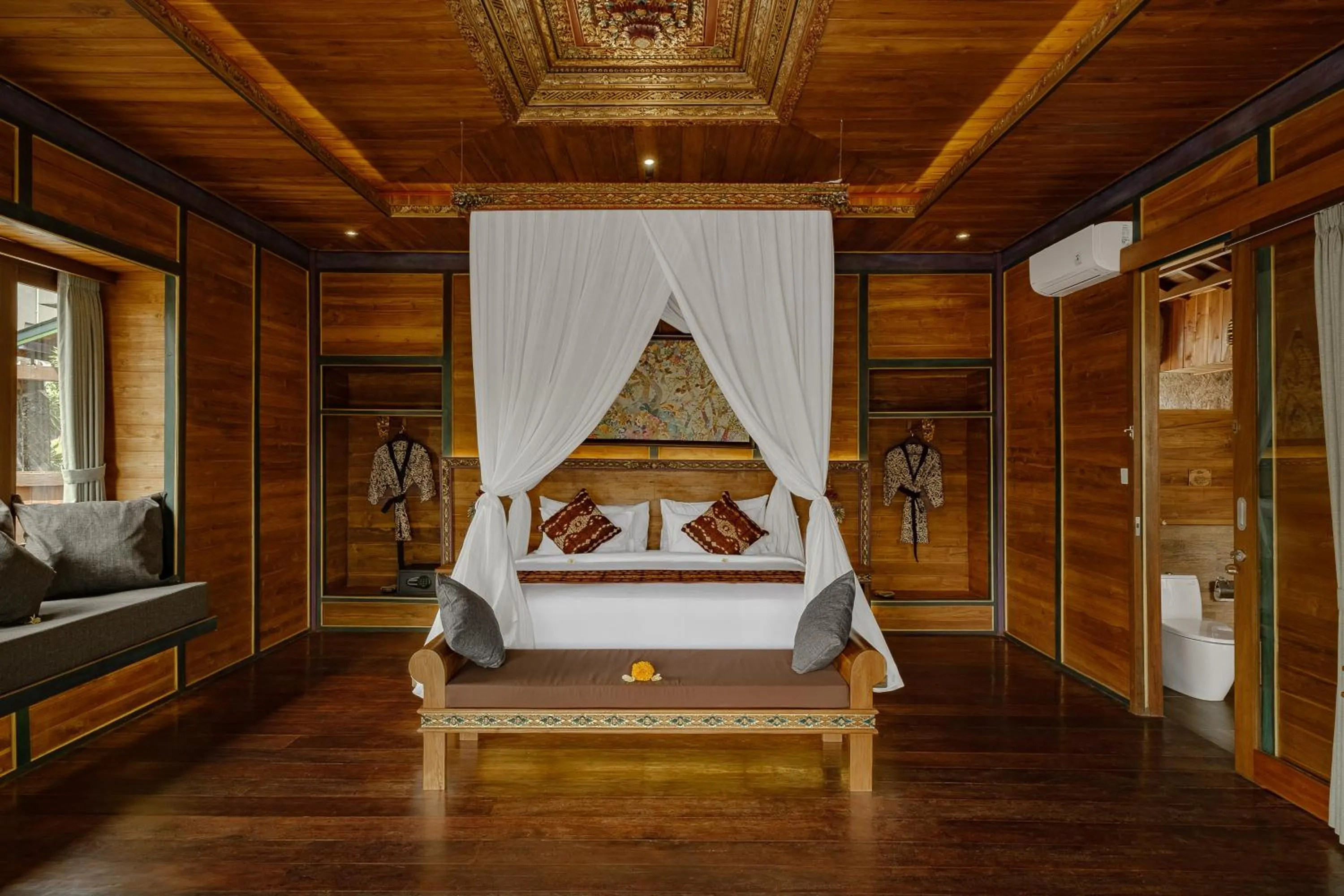 Bed in Gynandha Ubud Cottage