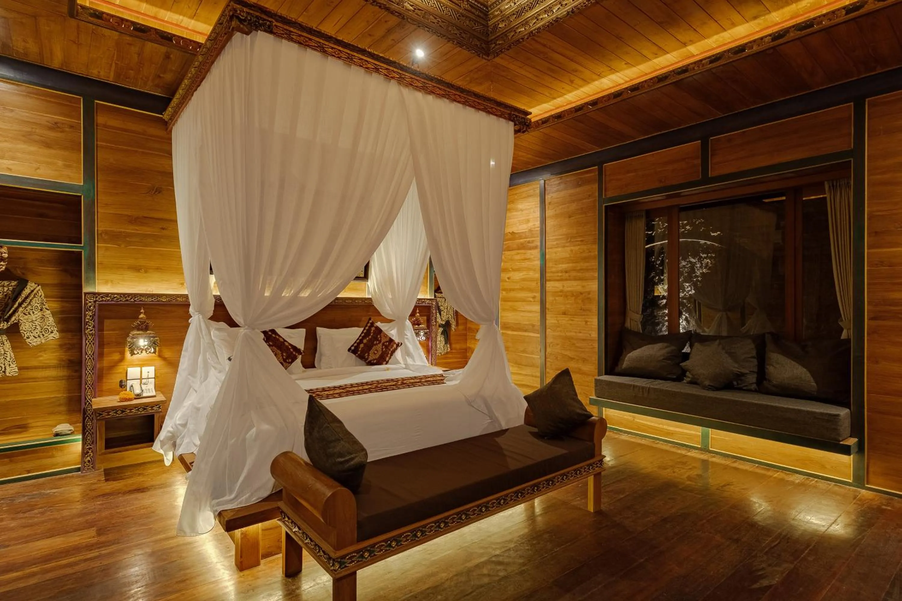 Bed in Gynandha Ubud Cottage