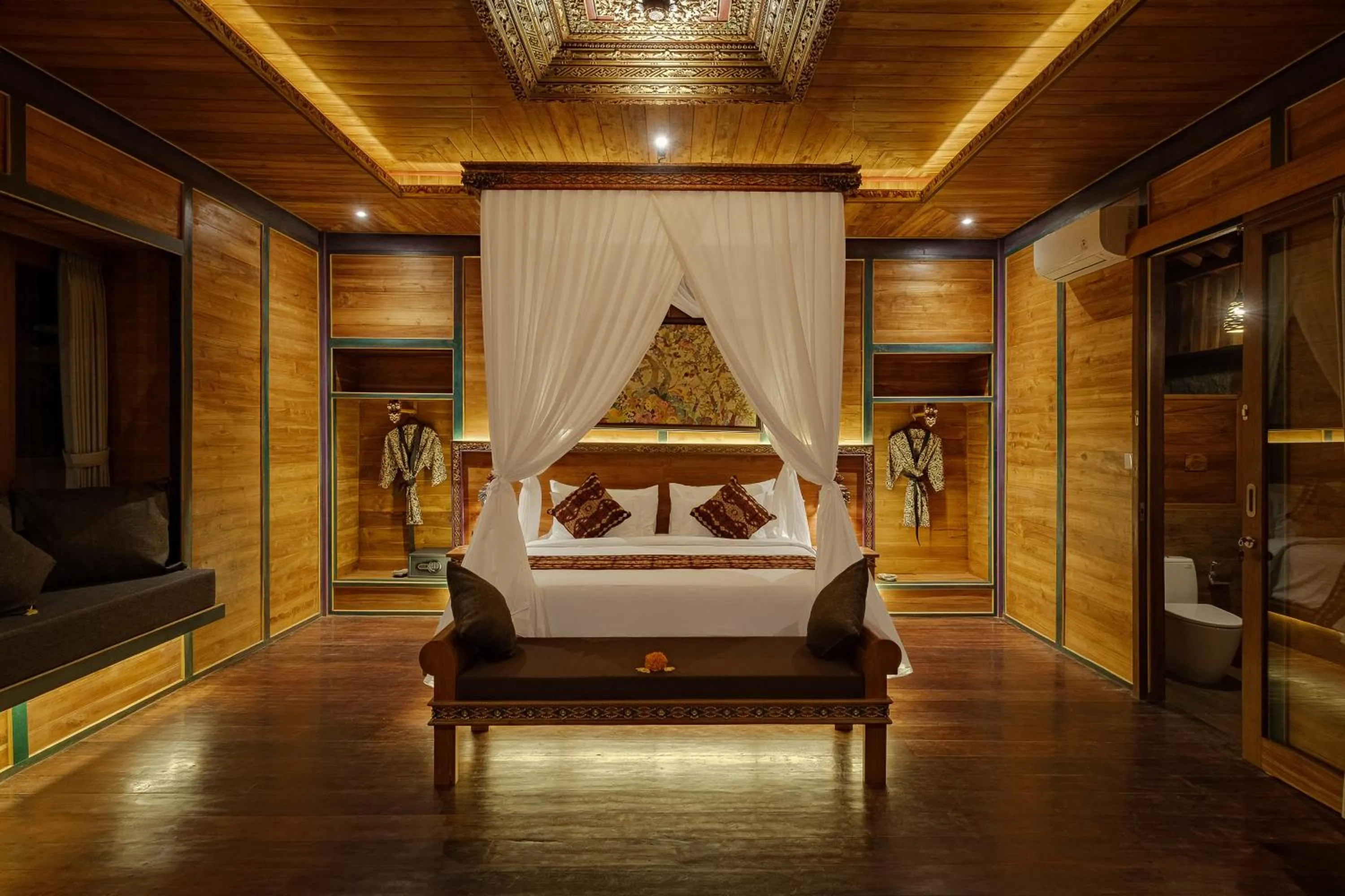 Bed in Gynandha Ubud Cottage