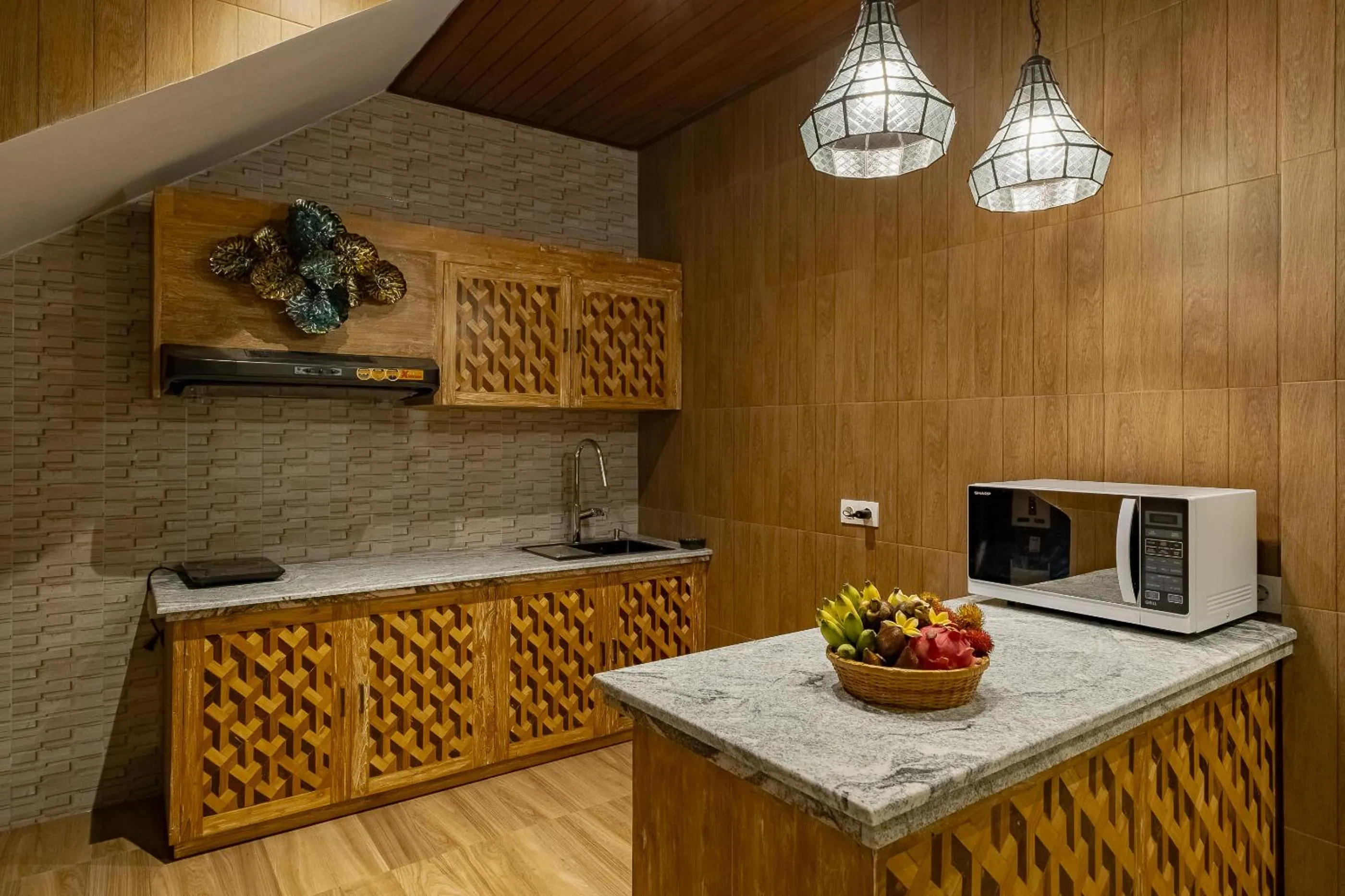 Kitchen or kitchenette in Gynandha Ubud Cottage