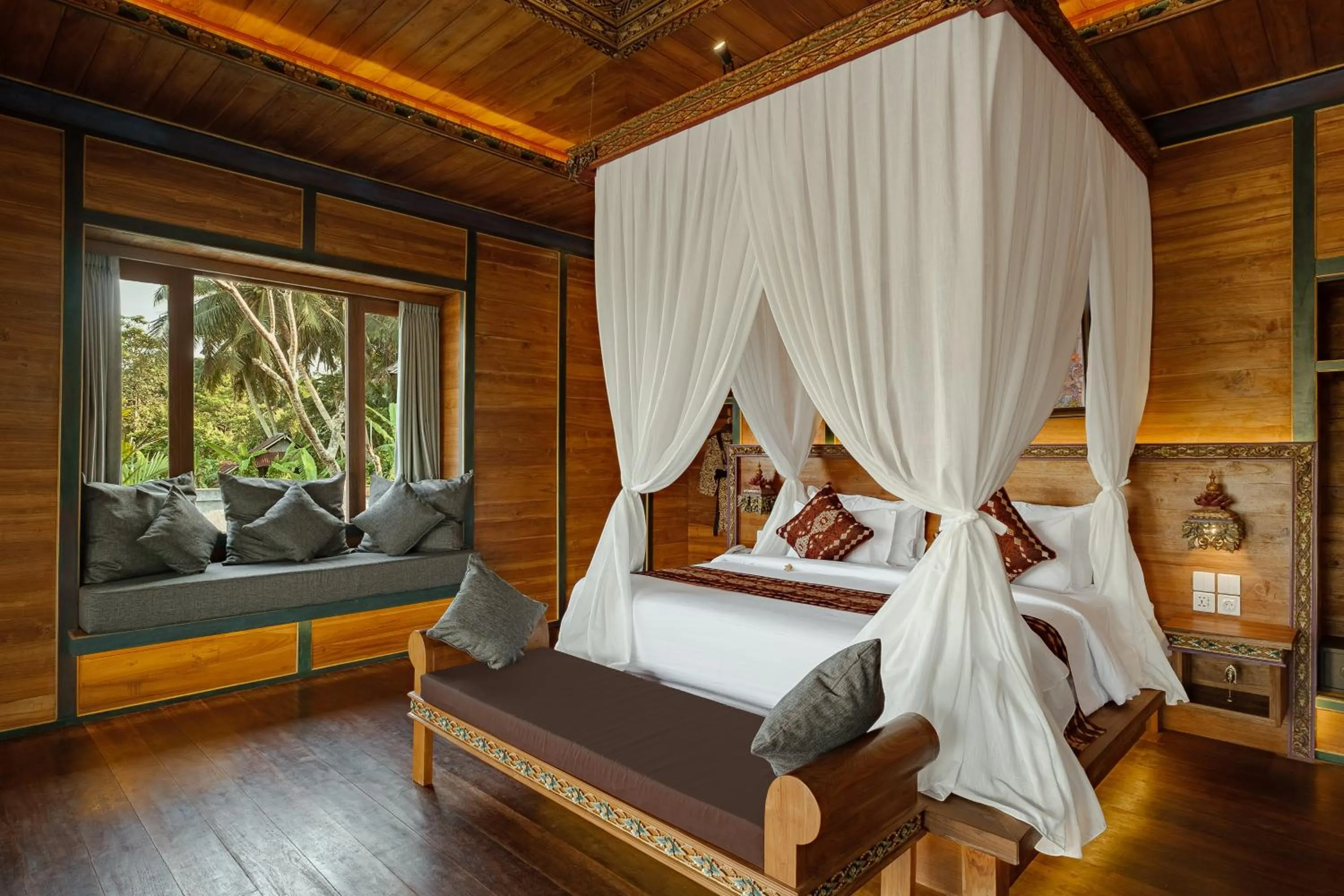 Bed in Gynandha Ubud Cottage