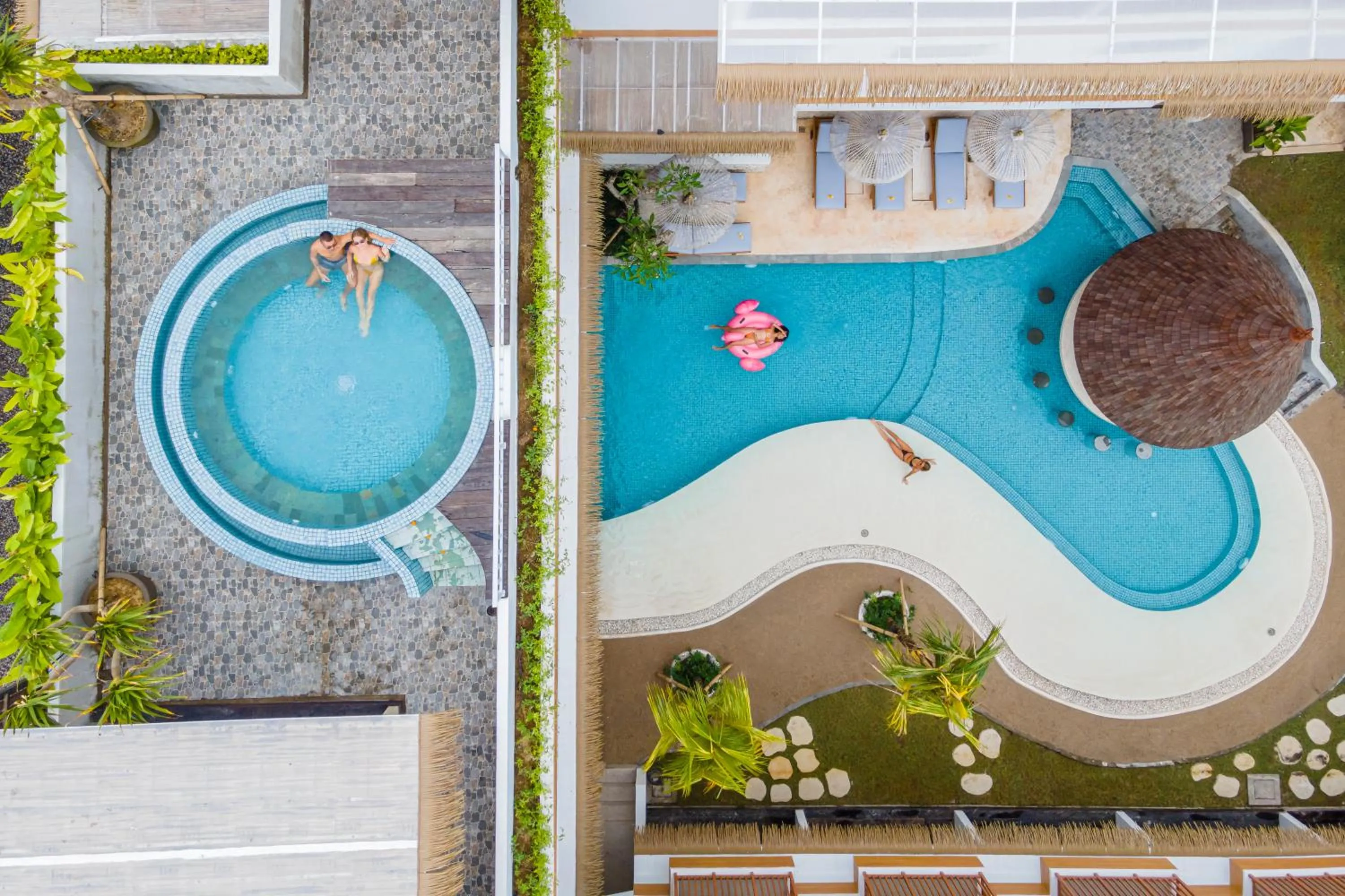 Swimming pool in Roomates Hostel Canggu by Ini Vie Hospitality