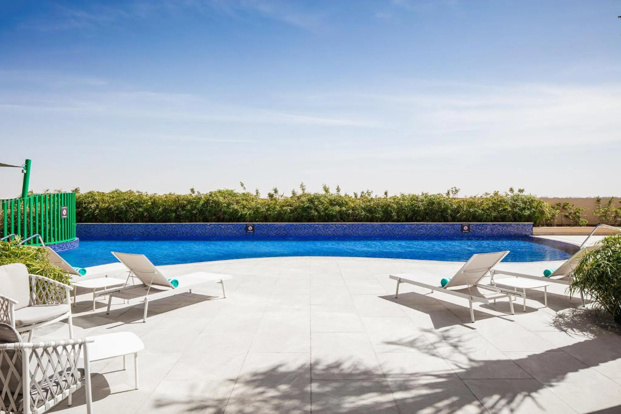 Swimming pool in Holiday Inn & Suites - Dubai Science Park by IHG