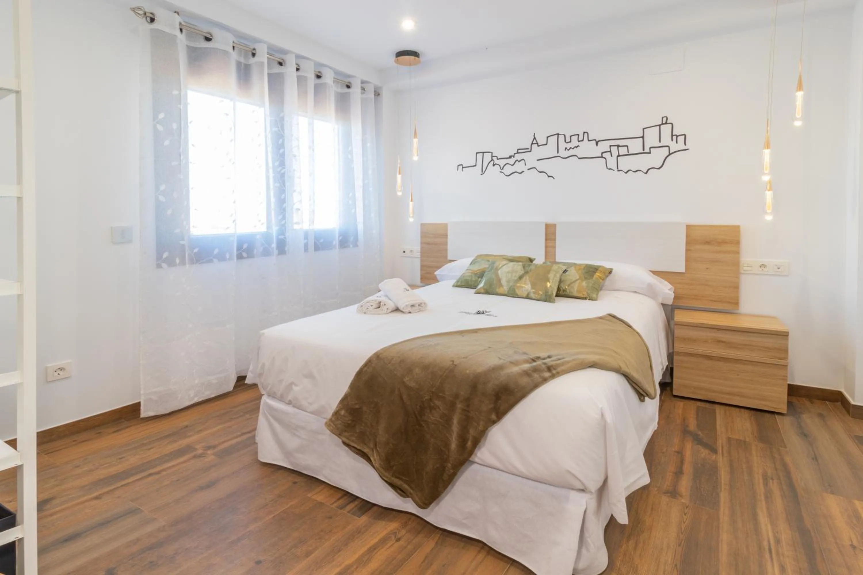 Bed in Hotel Reina Aixa