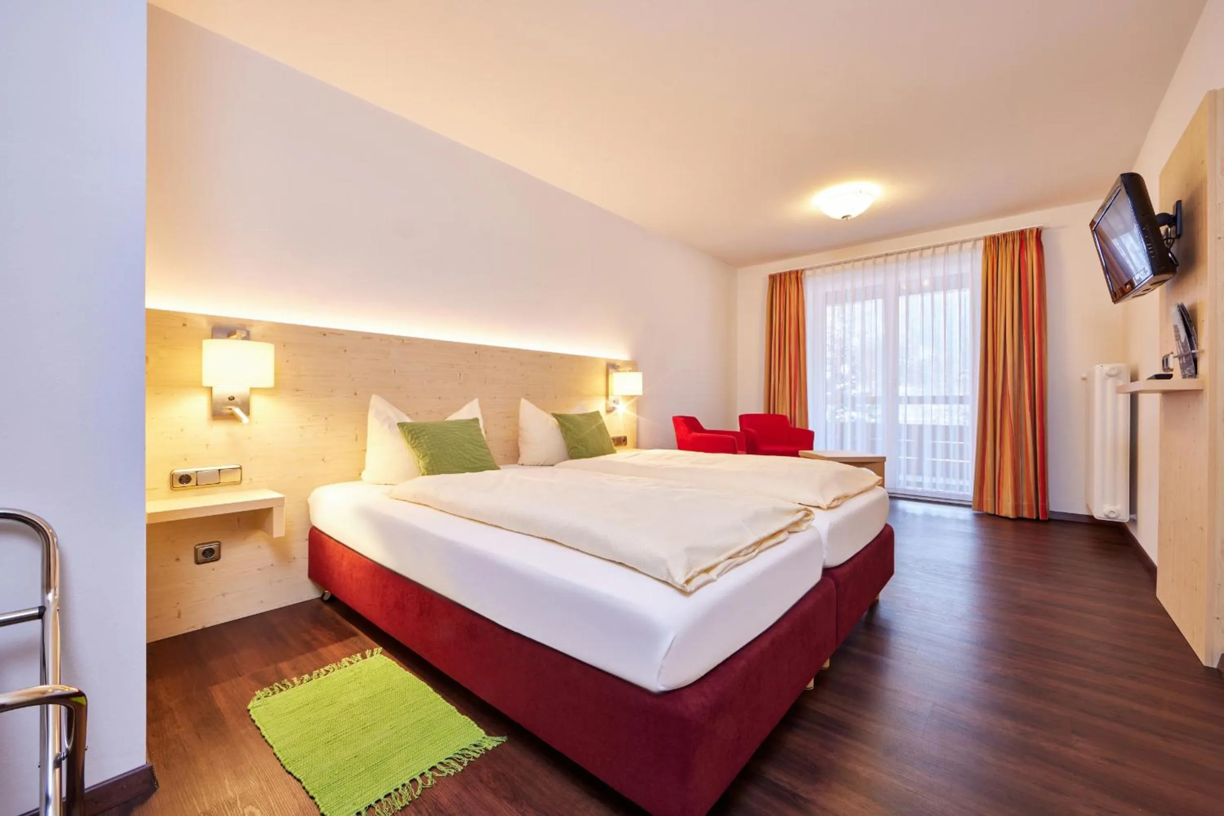 Bed in Zum Turm - Apartments und Gästezimmer