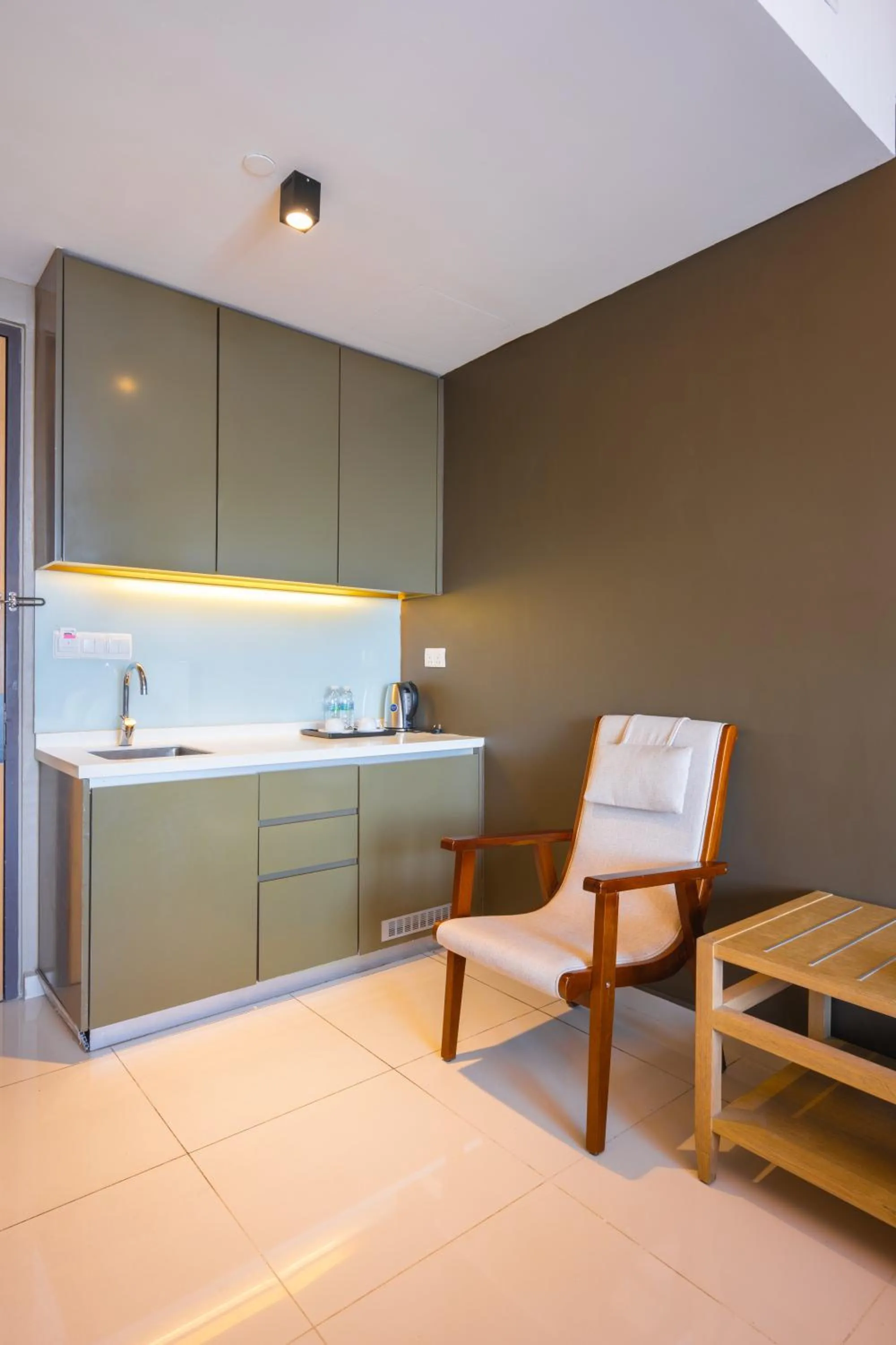 Seating area in Greystone 99 Suites