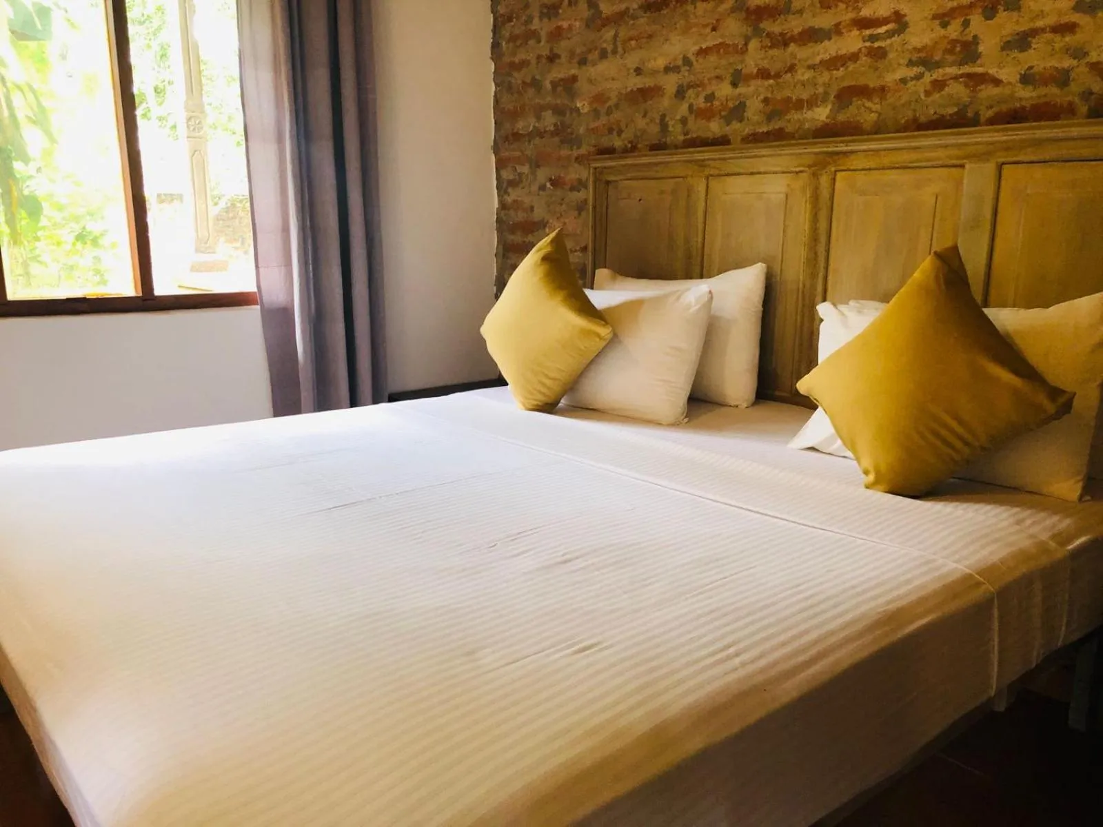 Bed in The Coastal Village Cabanas