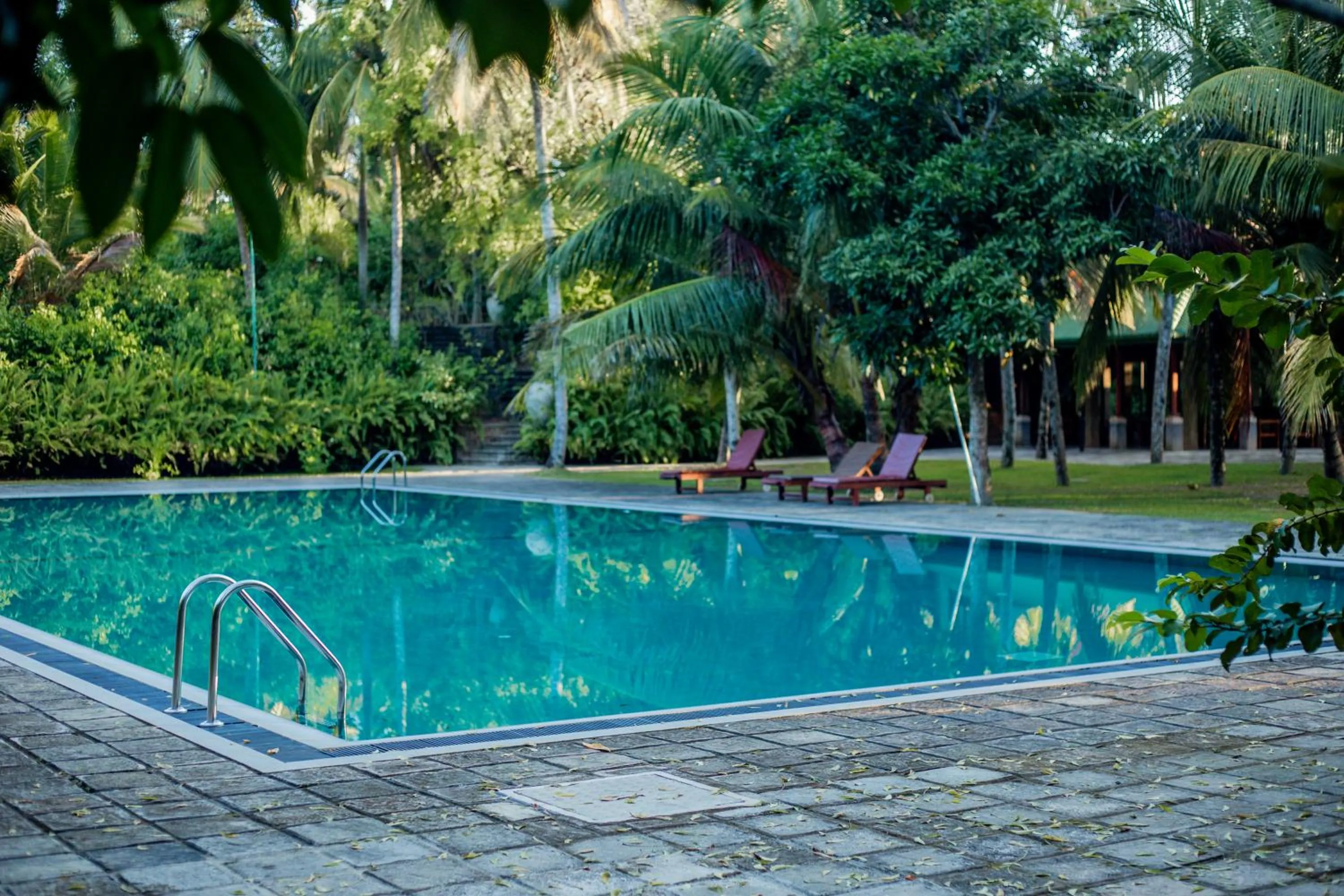 Swimming pool in The Coastal Village Cabanas