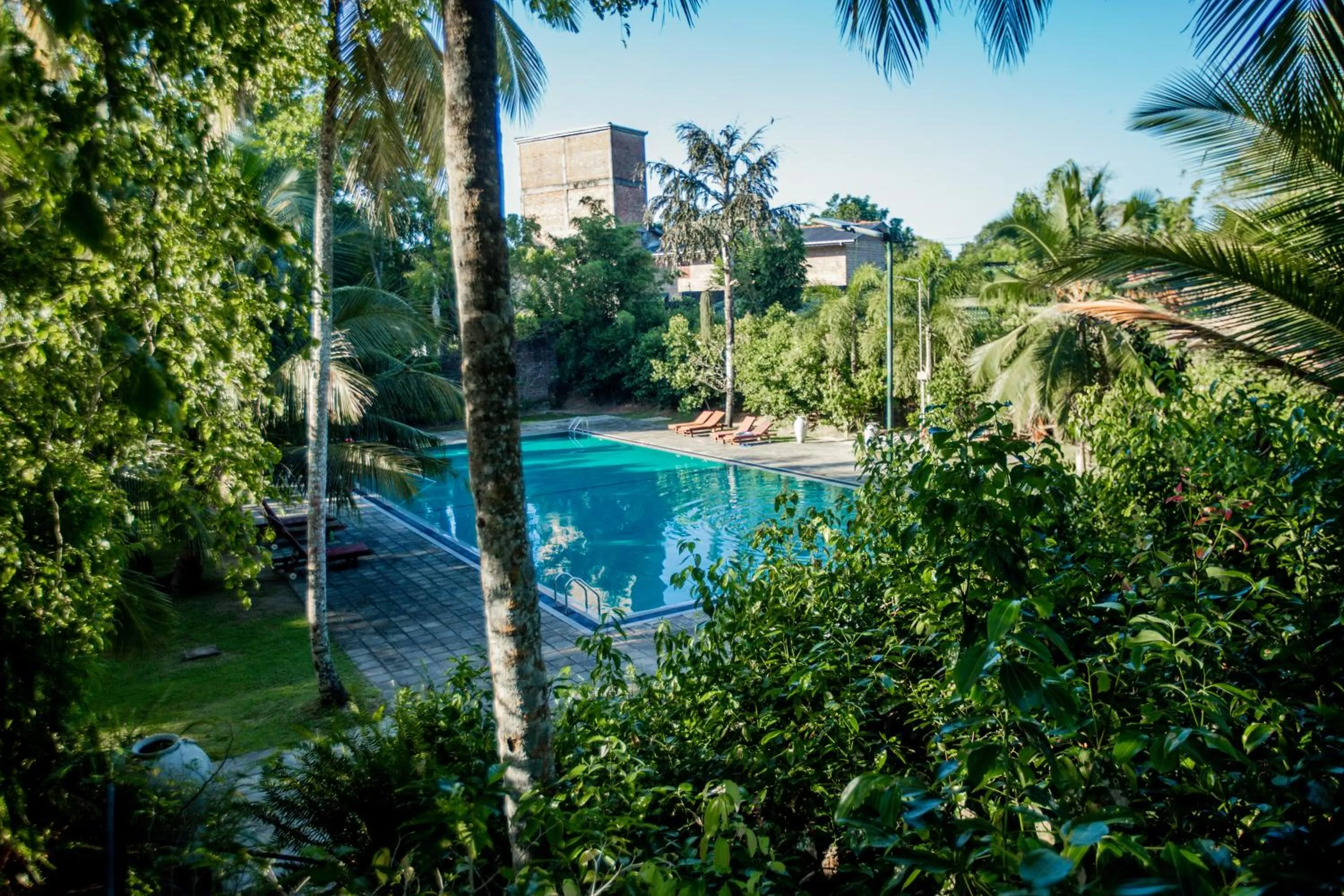 Swimming pool in The Coastal Village Cabanas