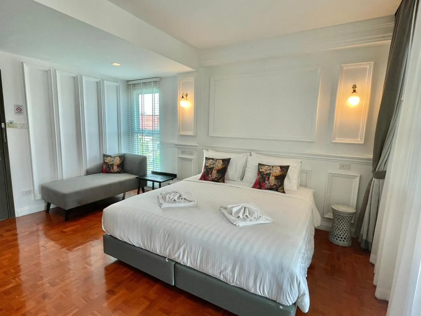 Bed in Wiang Ville Boutique Hotel