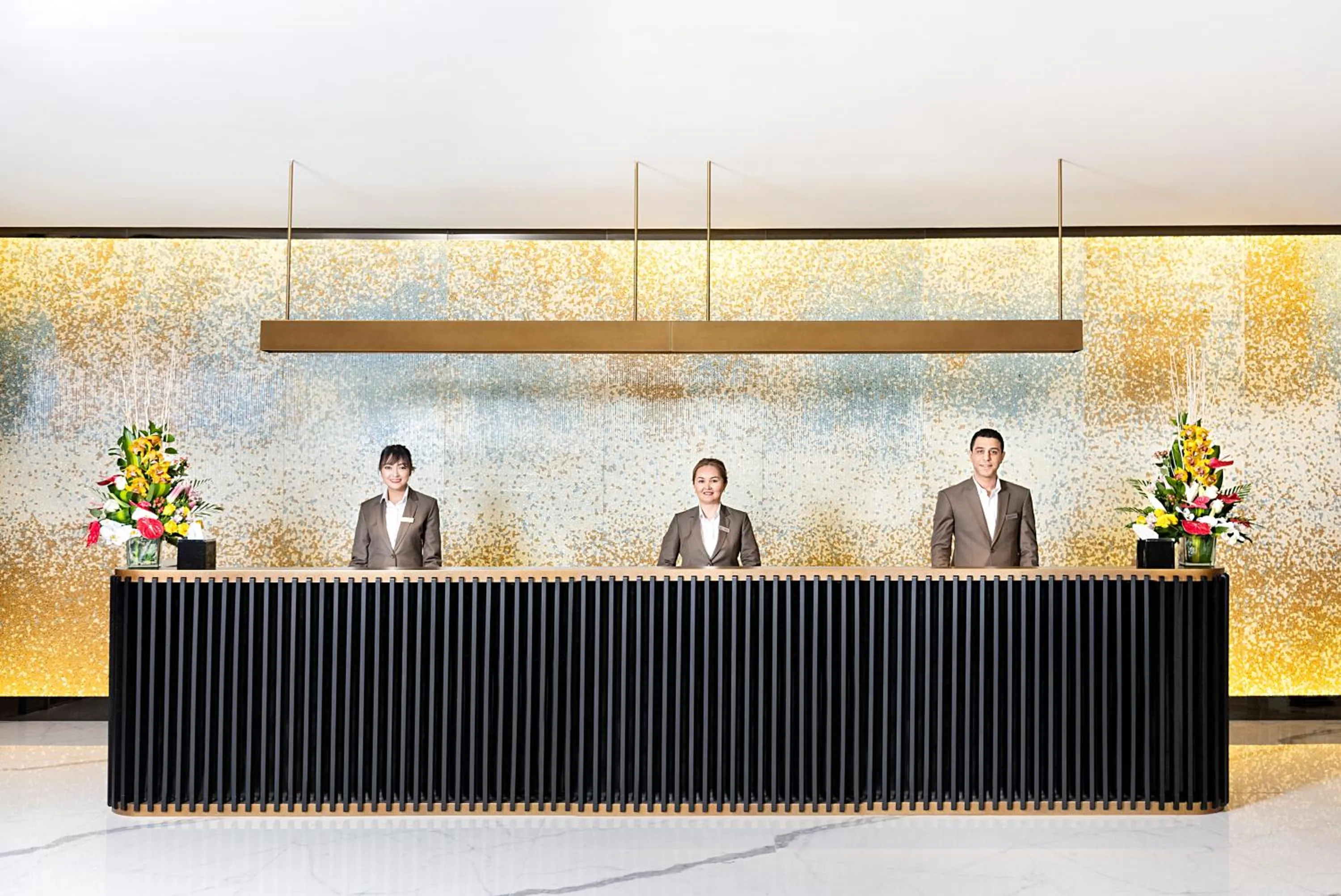 Lobby or reception in Asiana Grand Hotel