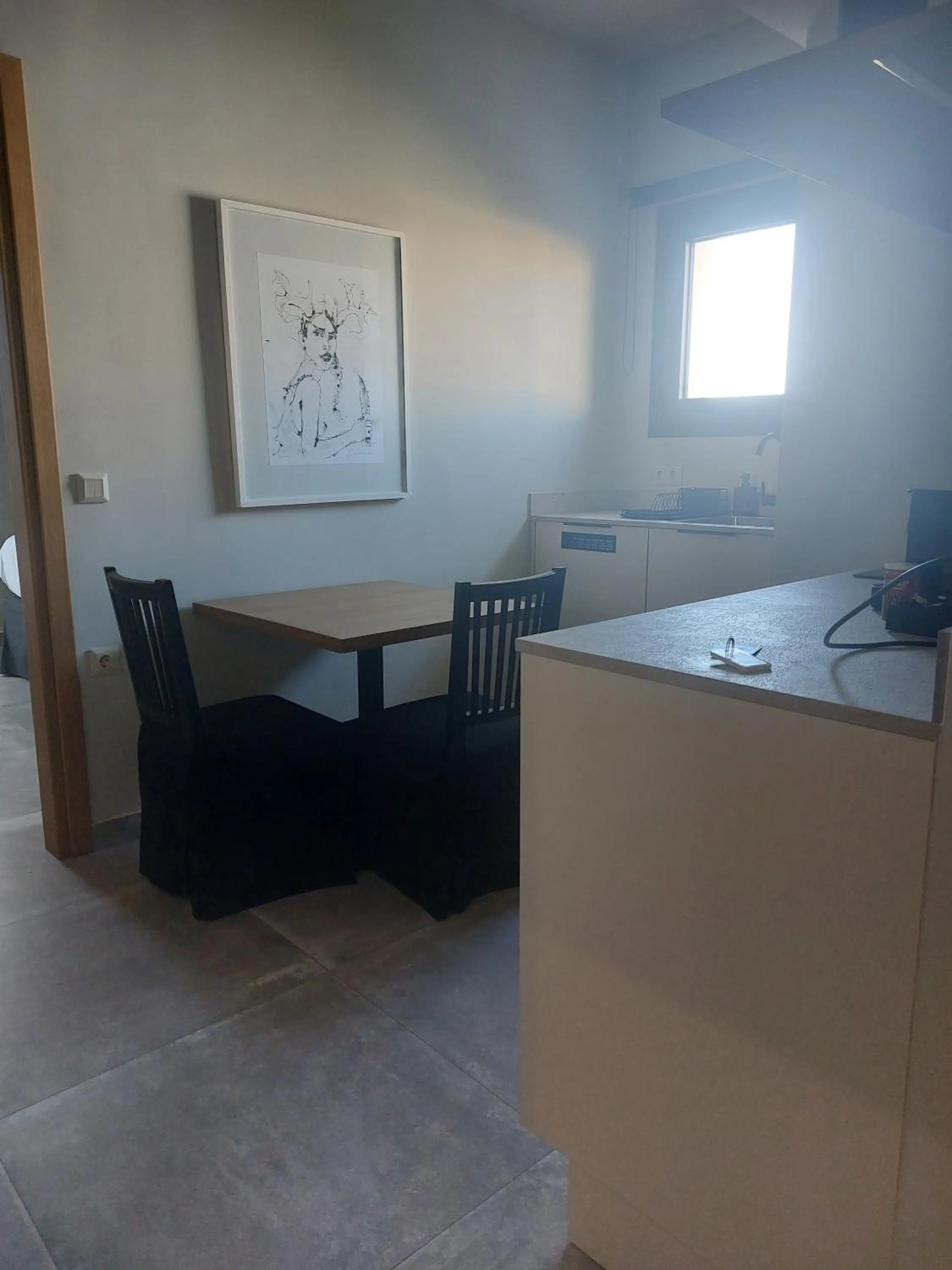 Kitchen or kitchenette in Chapter 02 Gallery Suites