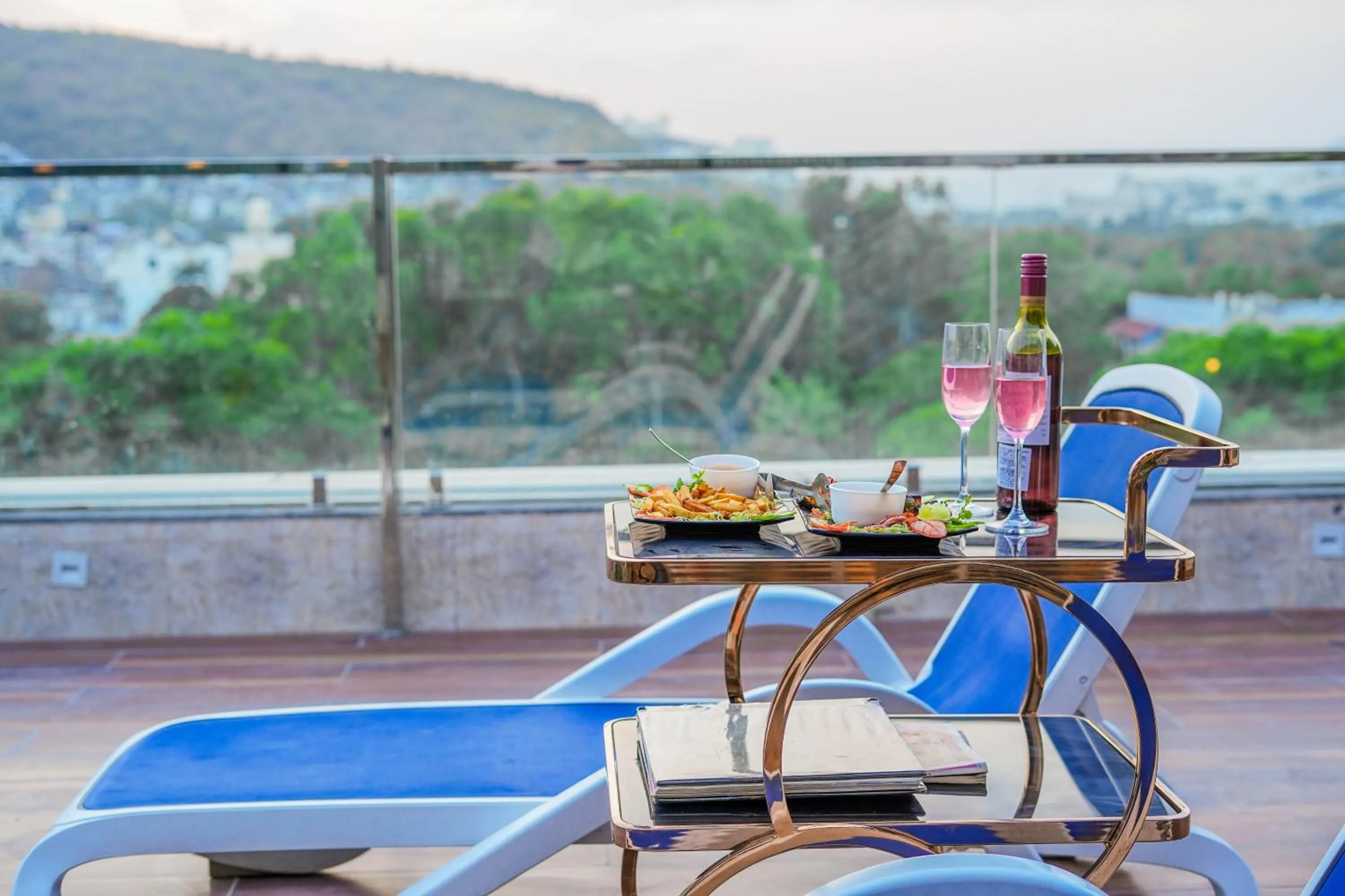 Balcony/Terrace in Pax Hotel Grand Blue 3 min walk from Udaipur city Railway Station
