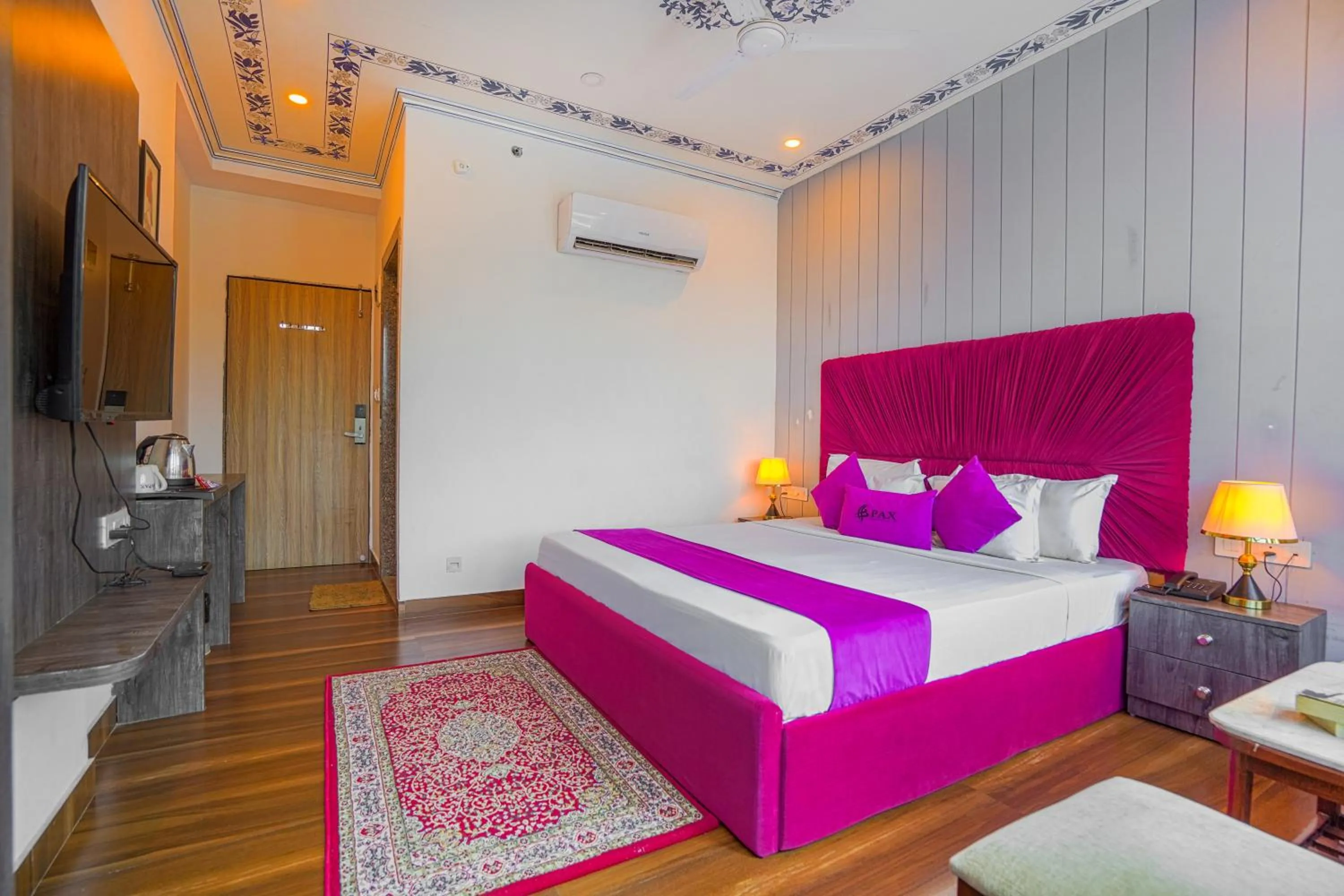 Bedroom, Bed in Pax Hotel Grand Blue 3 min walk from Udaipur city Railway Station