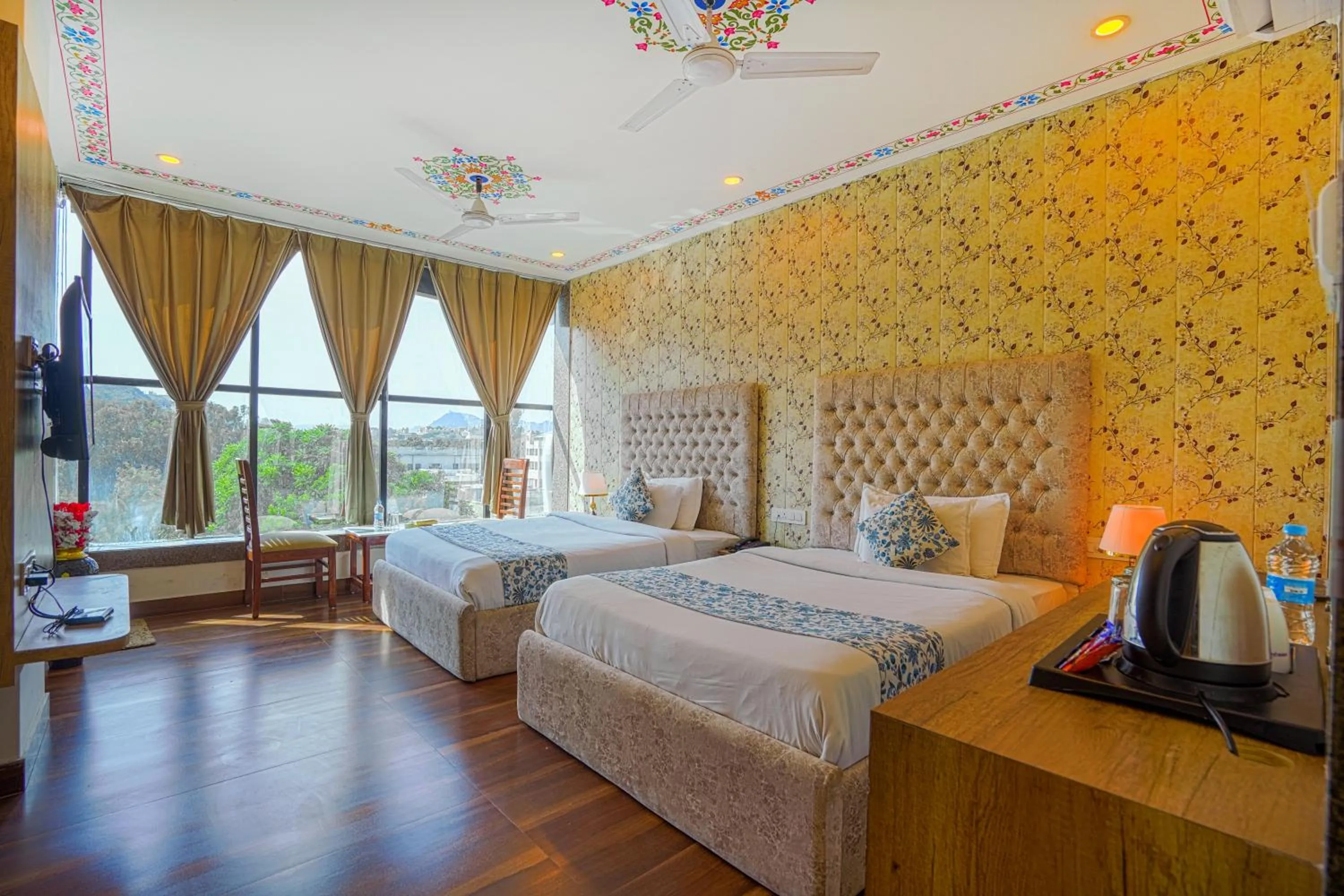 Bedroom, Bed in Pax Hotel Grand Blue 3 min walk from Udaipur city Railway Station
