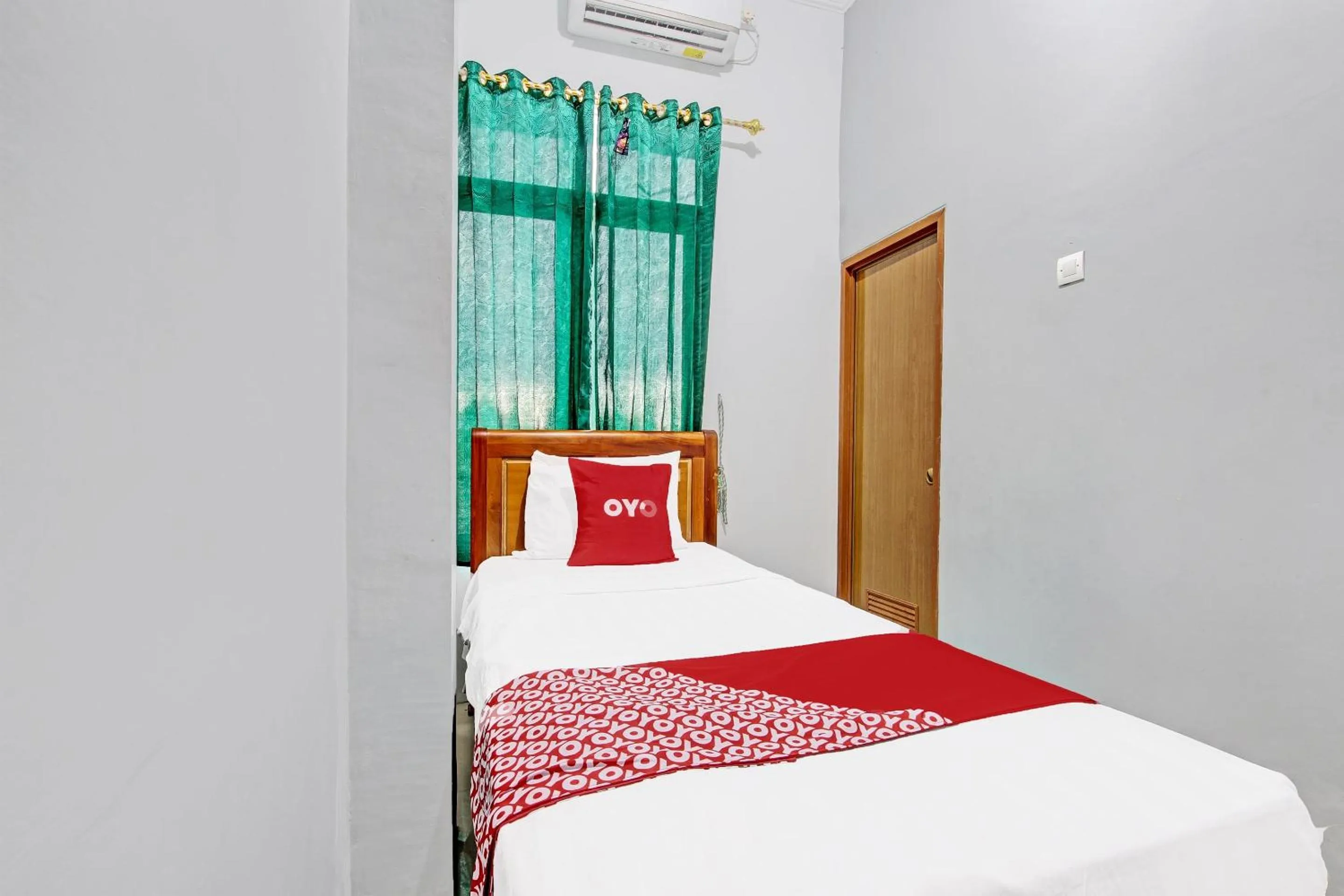 Bedroom in OYO 91960 Fariza House Syariah