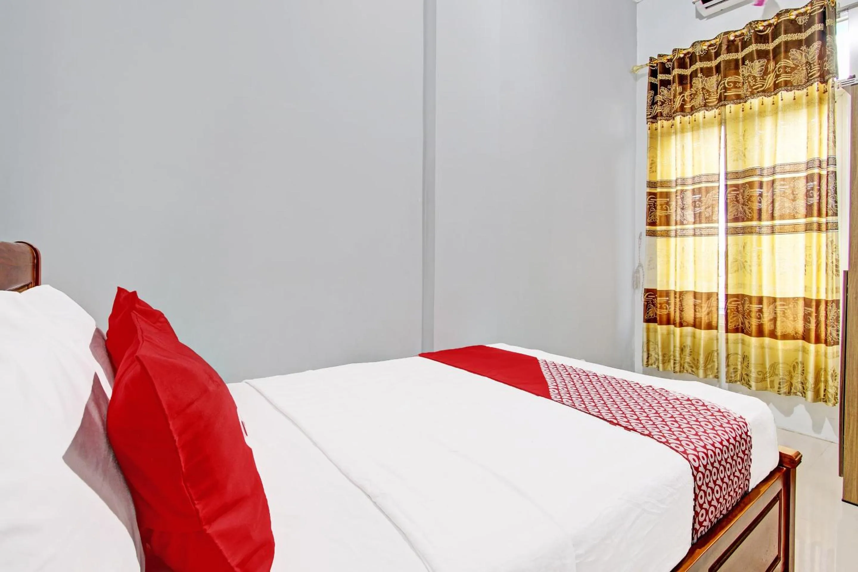 Bedroom in OYO 91960 Fariza House Syariah