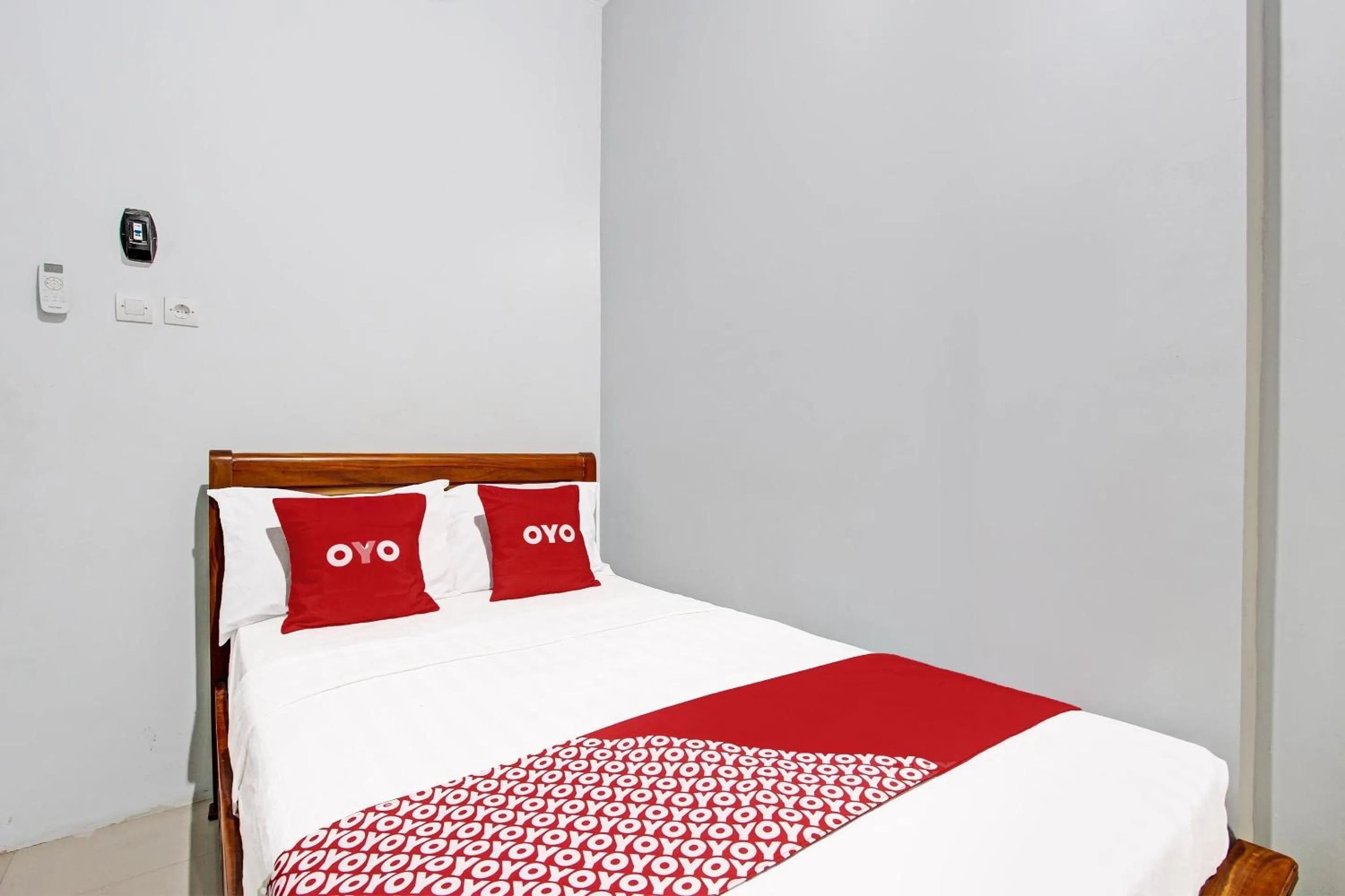 Bedroom in OYO 91960 Fariza House Syariah