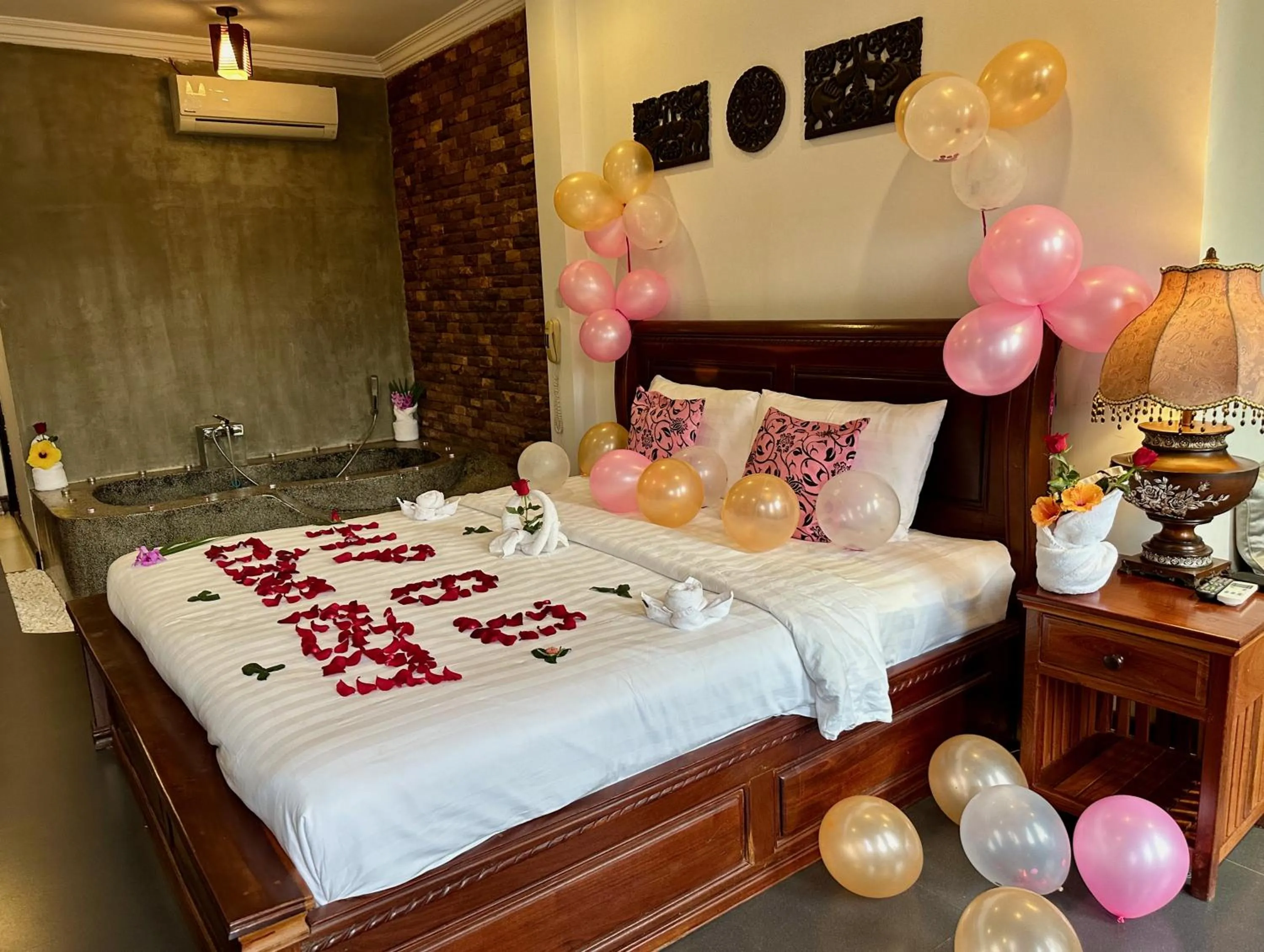 Bed in The Five Senses Boutique Hotel