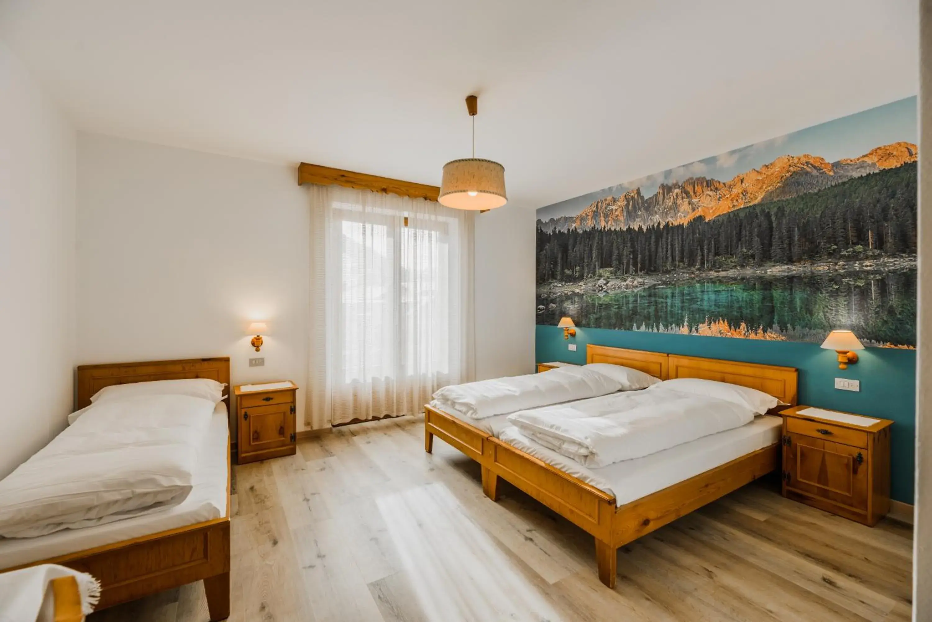 Triple Room in Hotel Garnì Rosengarten Triple Room in Hotel Garnì Rosengarten