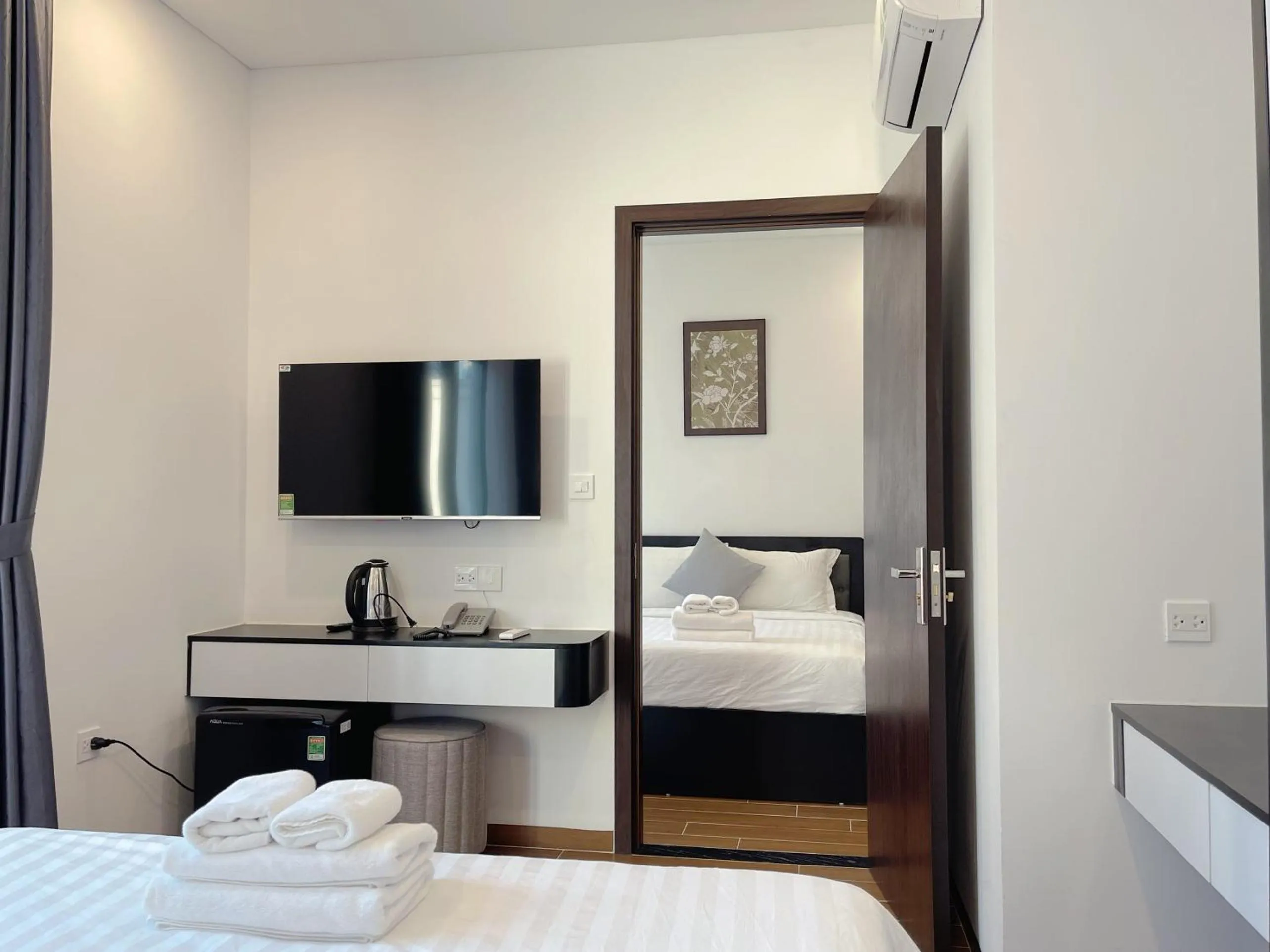 Photo of the whole room, Bed in Le Palmier Phu Quoc Hotel - Free Shuttle To Grand World