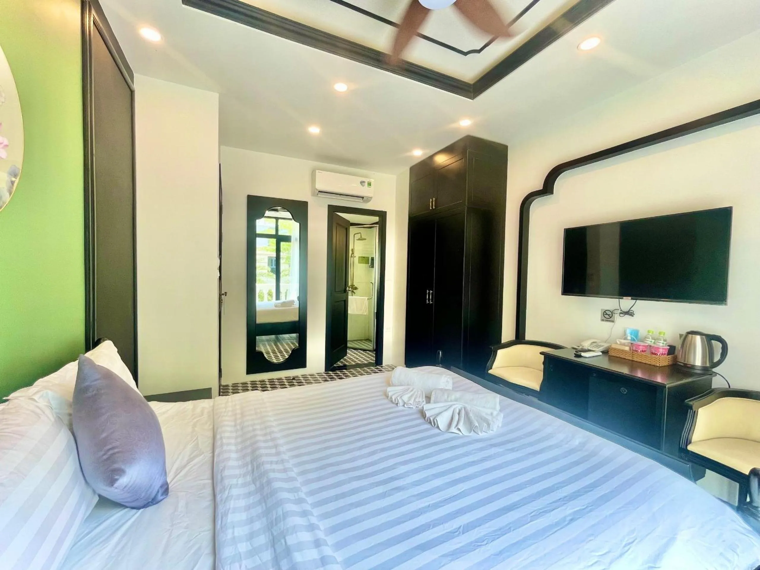Photo of the whole room, Bed in Le Palmier Phu Quoc Hotel - Free Shuttle To Grand World