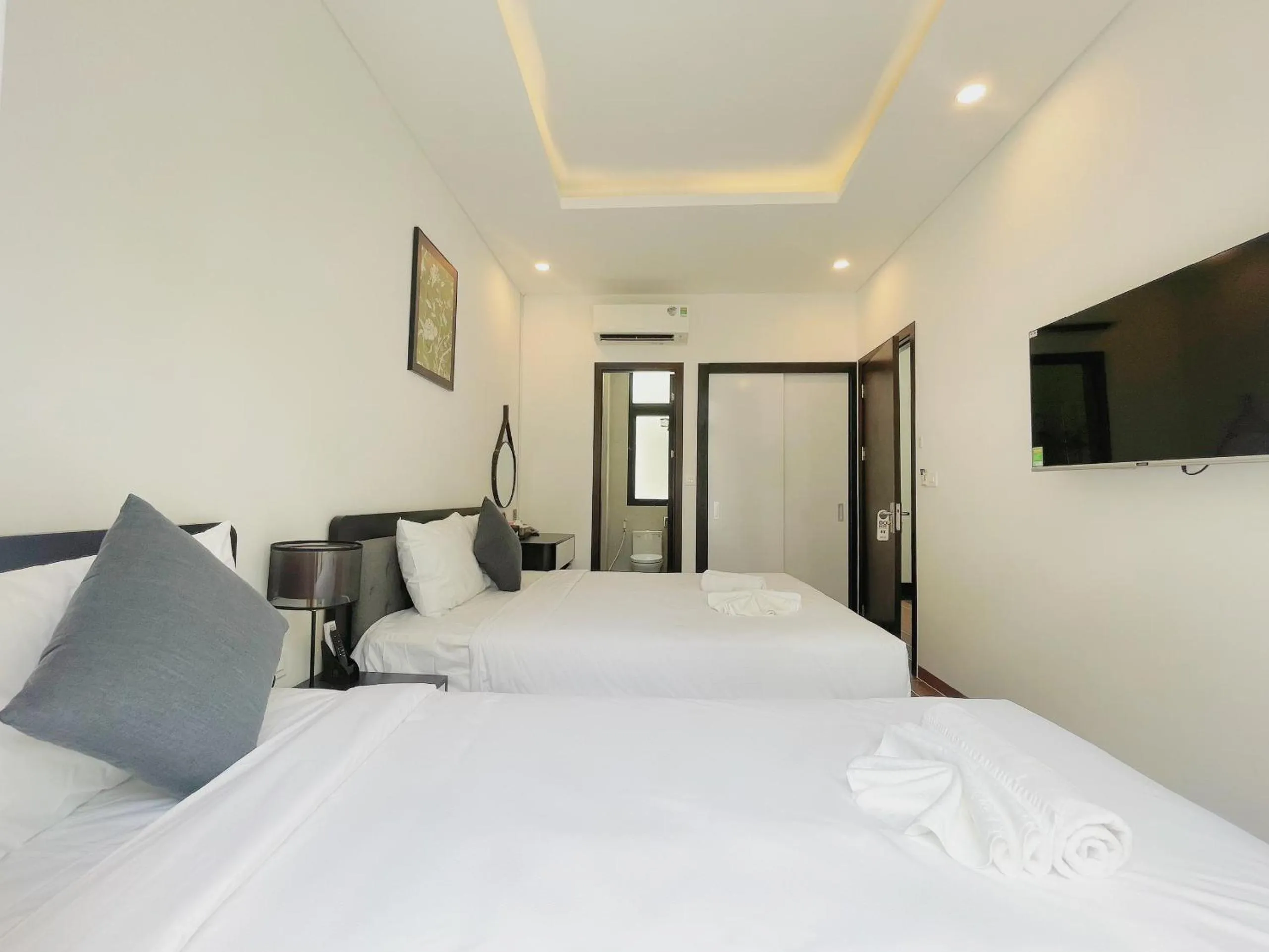 Photo of the whole room, Bed in Le Palmier Phu Quoc Hotel - Free Shuttle To Grand World