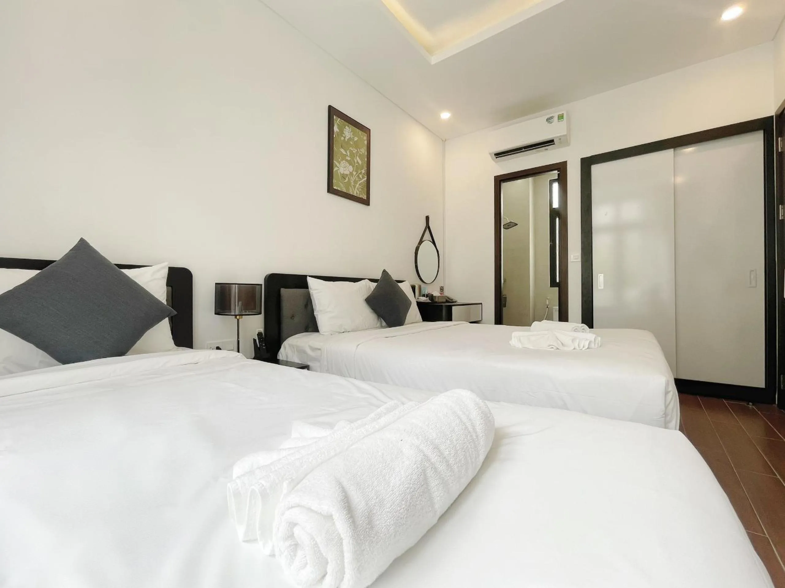 Bed in Le Palmier Phu Quoc Hotel - Free Shuttle To Grand World